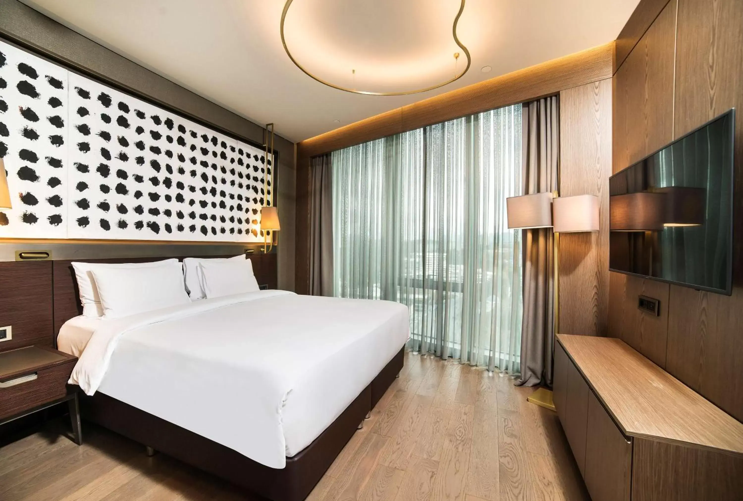 TV and multimedia, Bed in Radisson Collection Hotel, Vadistanbul