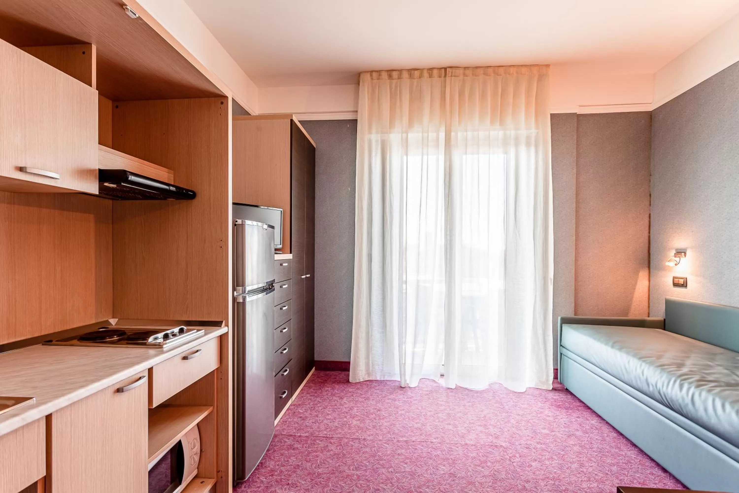 Kitchen or kitchenette in Residence & Suites