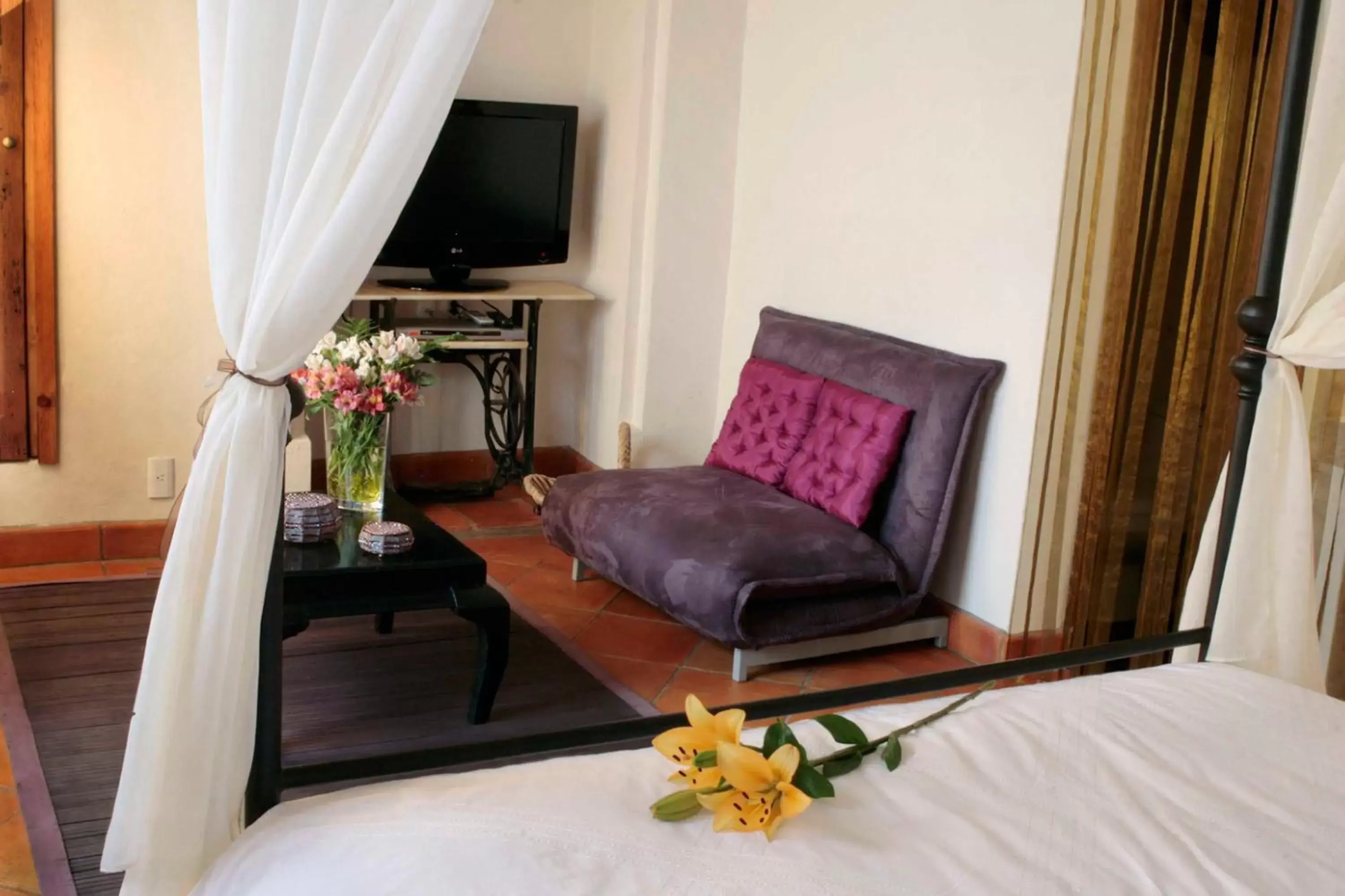 Bedroom, Seating Area in La Casa del Naranjo Hotel Boutique
