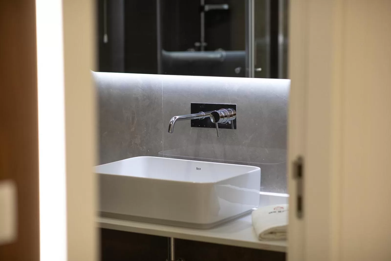 Bathroom in The ICONS Lisbon Hotel