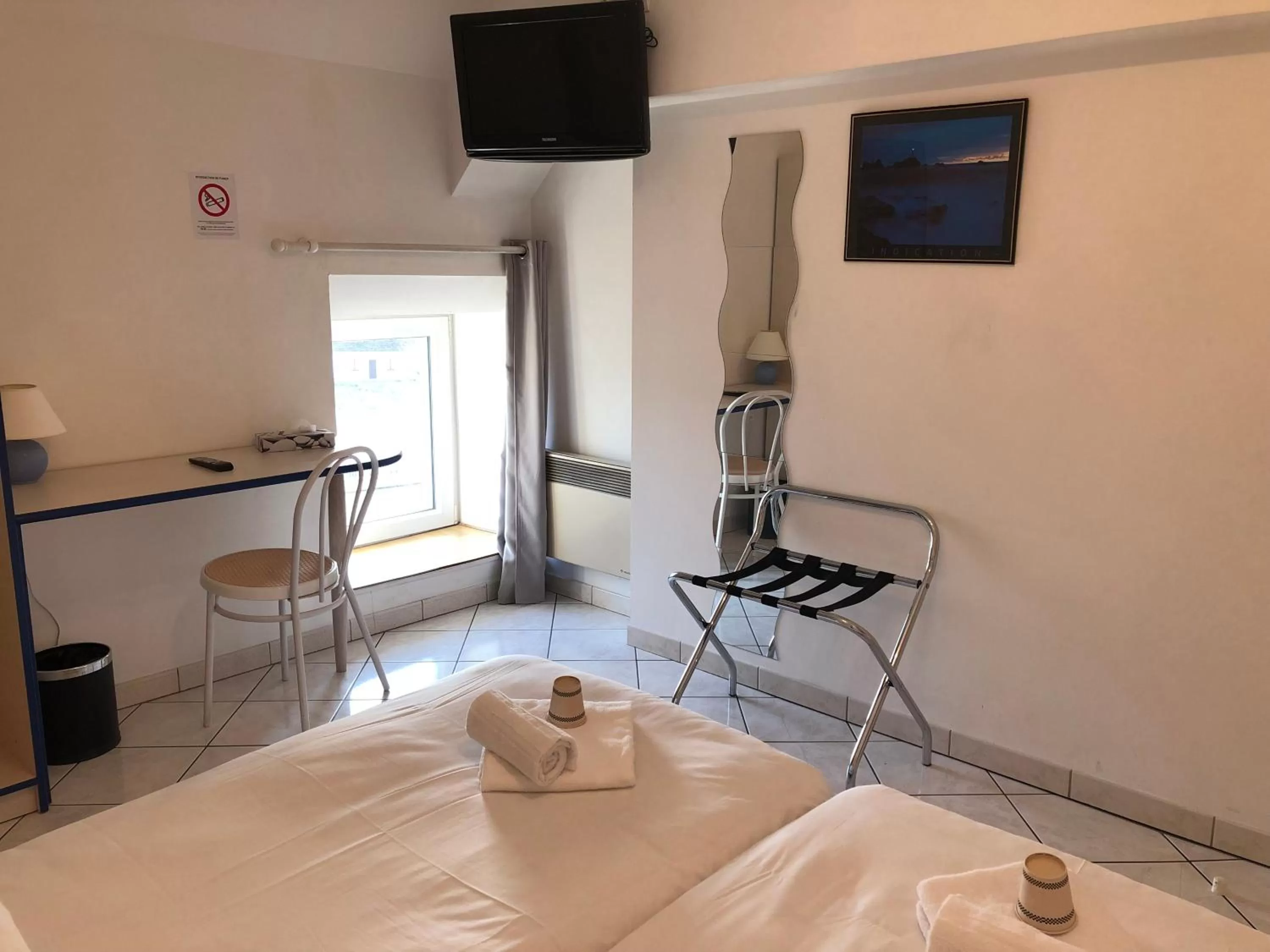 TV and multimedia, TV/Entertainment Center in Enzo Hotels Neufchâteau by Kyriad Direct