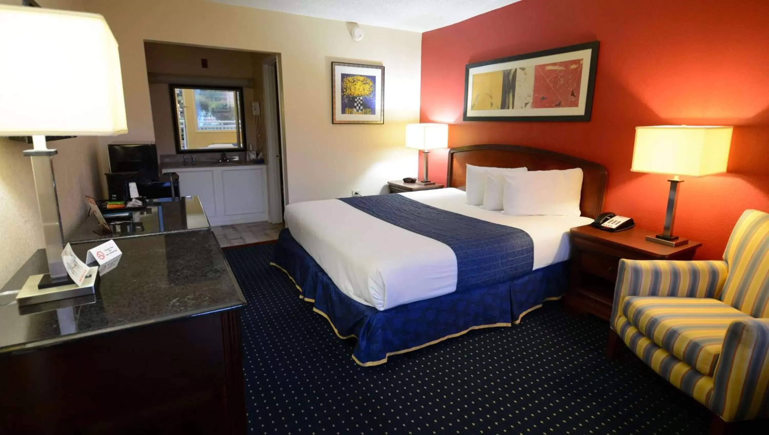 Photo of the whole room, Bed in Magnuson Hotel Virginia Beach