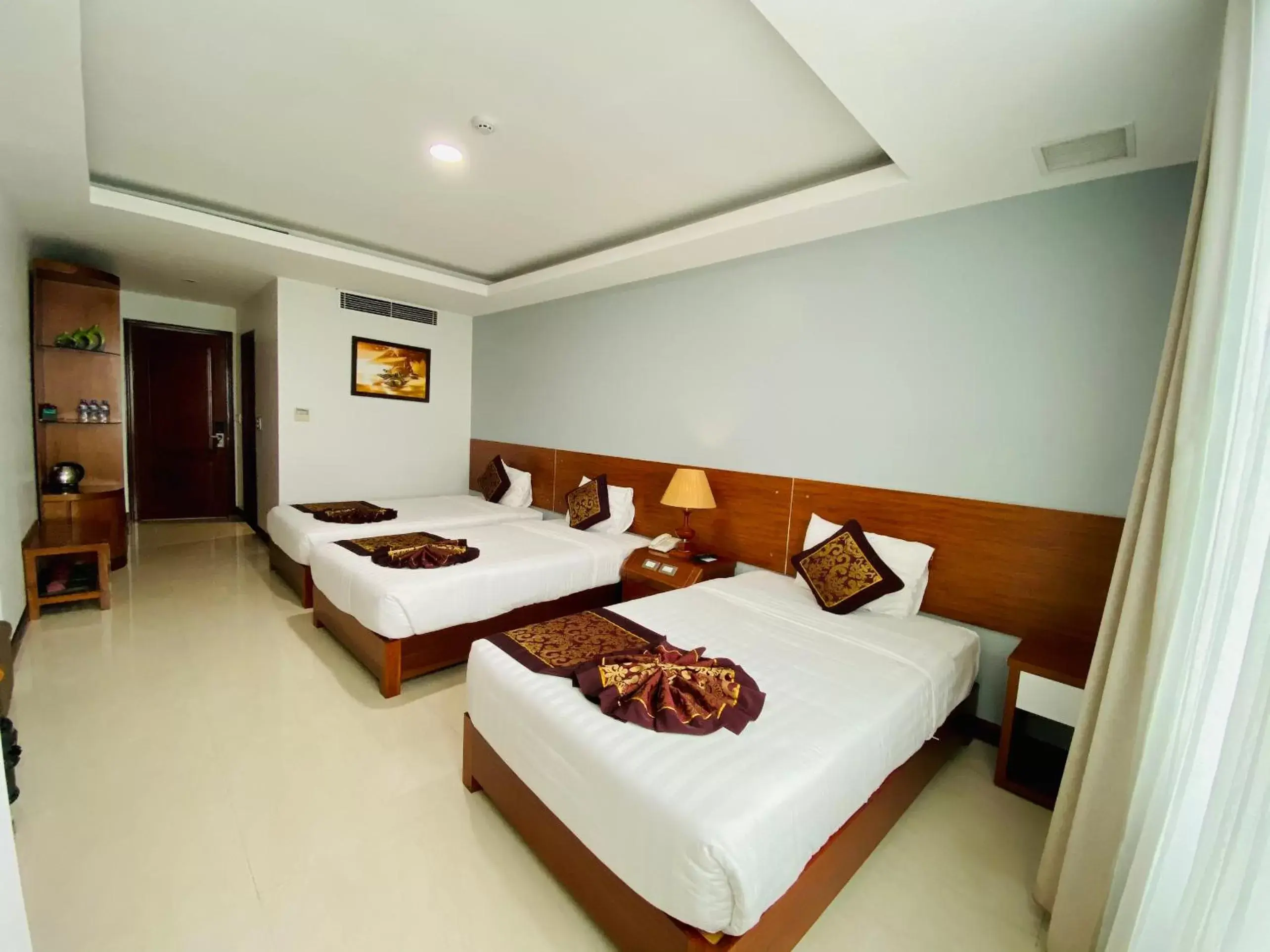 Bed in Kim Thai Hotel Bed in Kim Thai Hotel