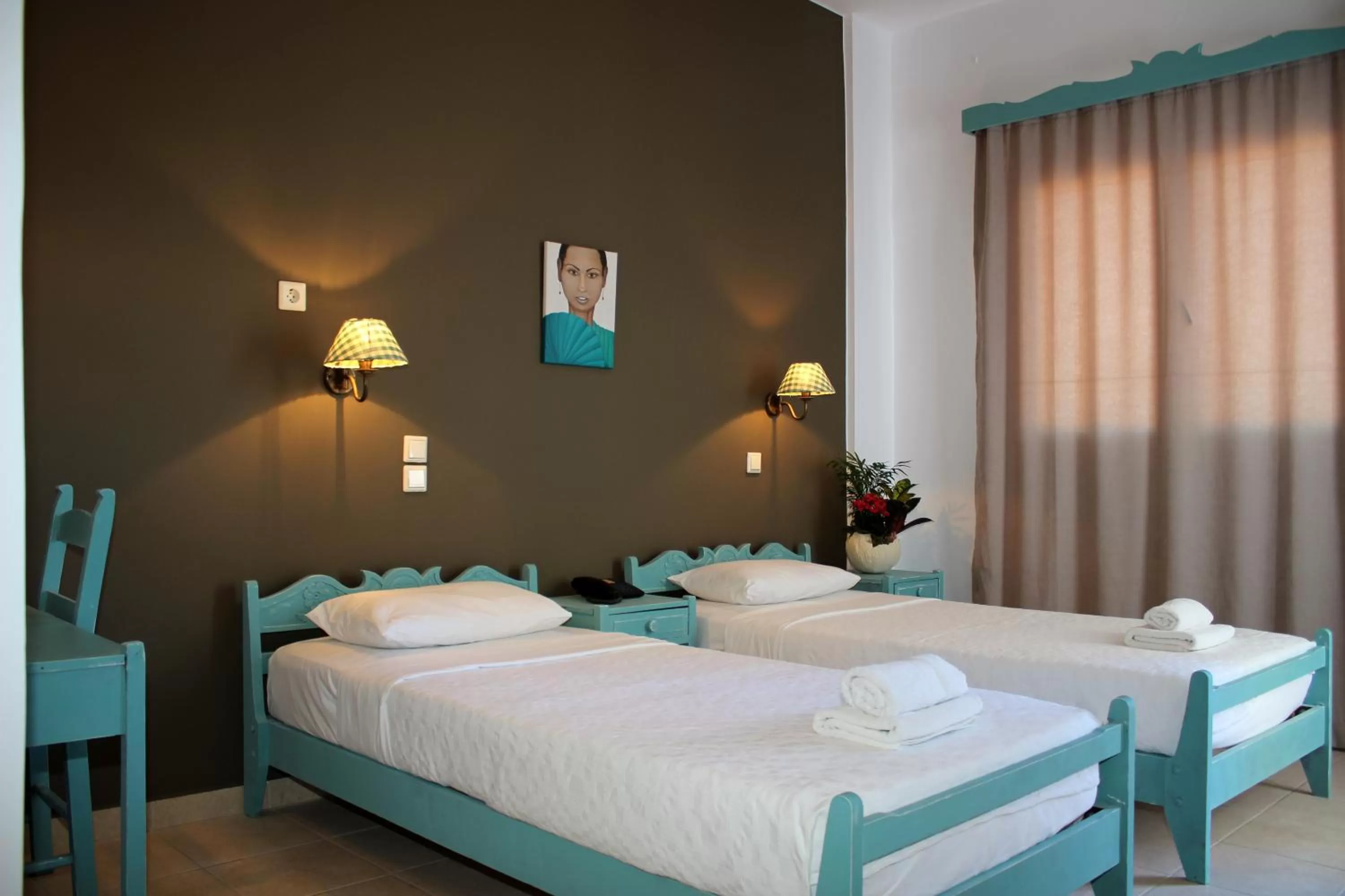 Bed in Ikaros Art Hotel