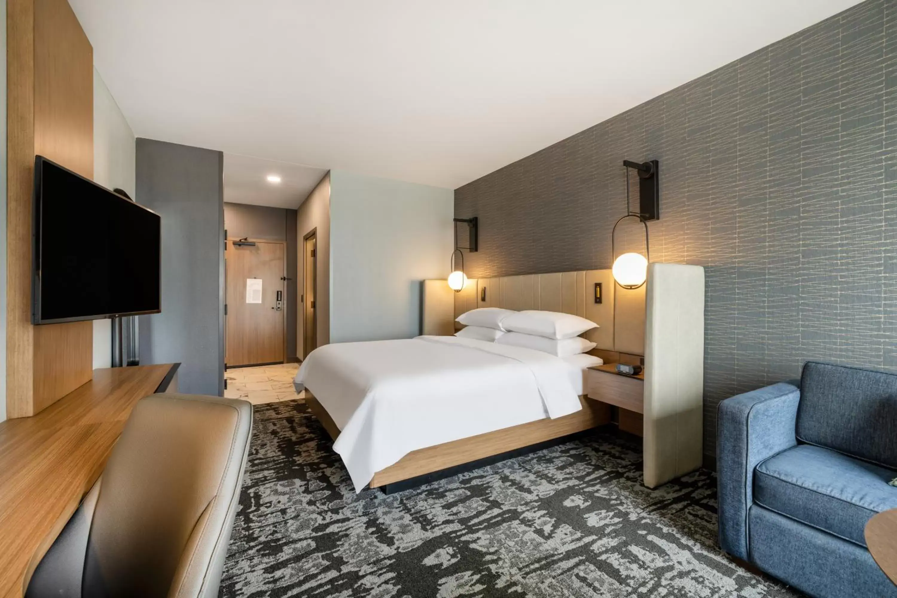 Bed in Crowne Plaza - Kearney, an IHG Hotel