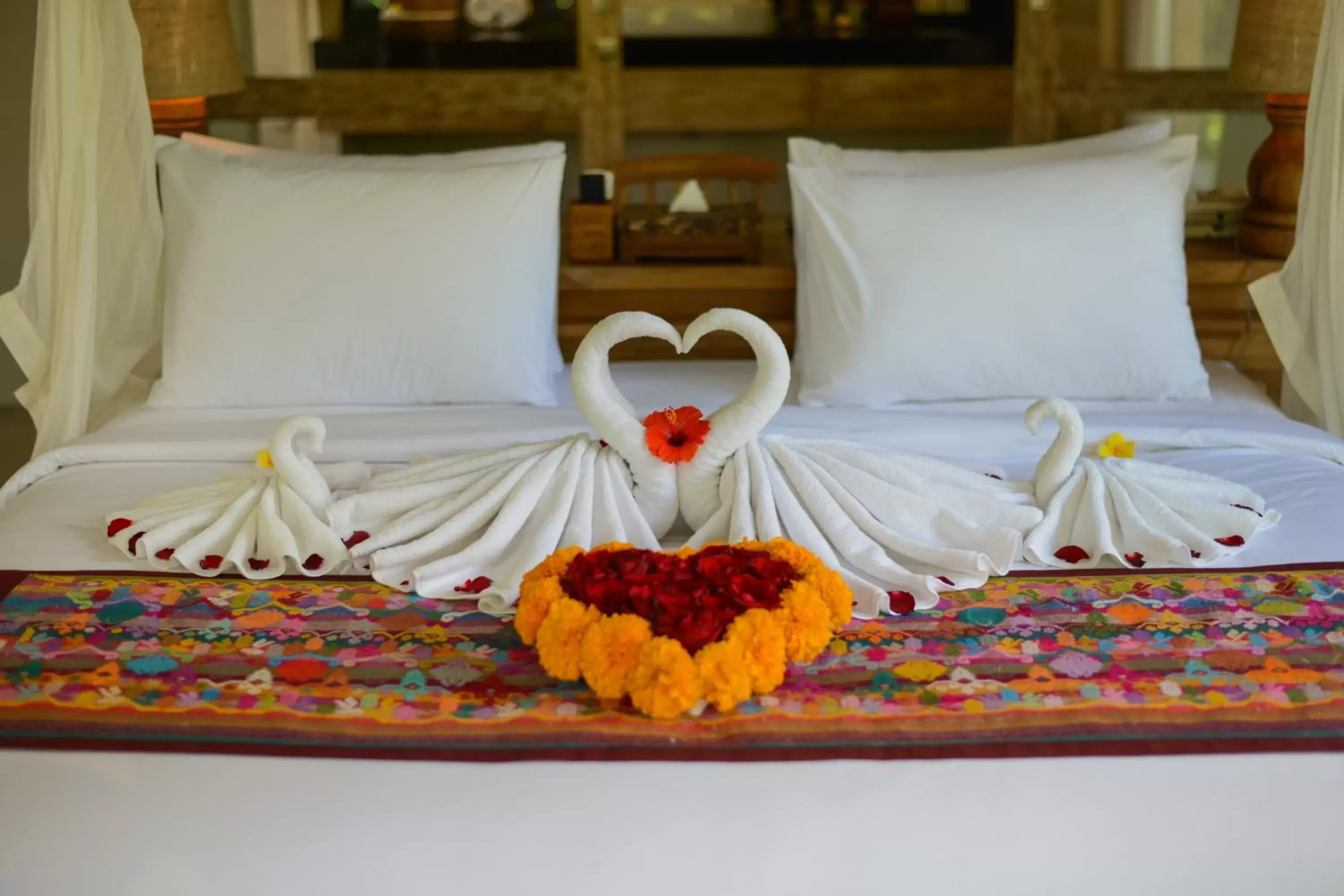 Bed in Purana Boutique Resort
