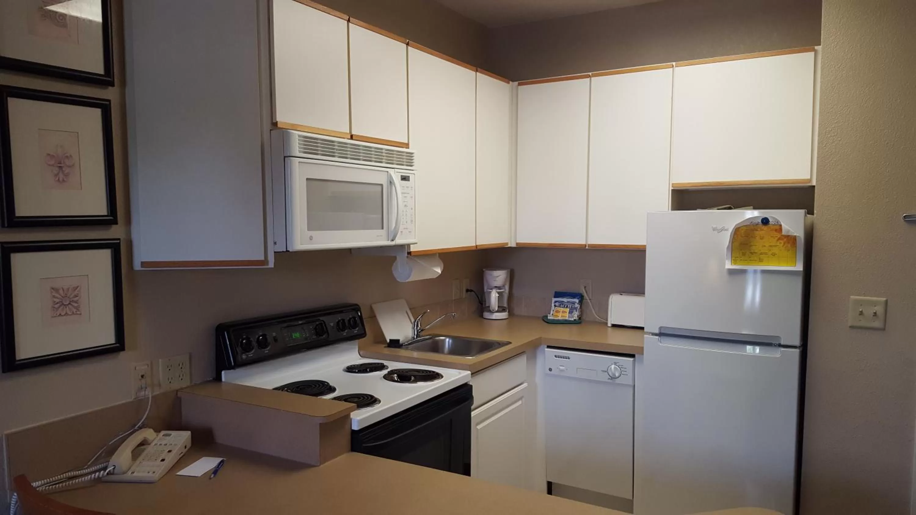 Kitchen or kitchenette in Baymont by Wyndham Wichita East