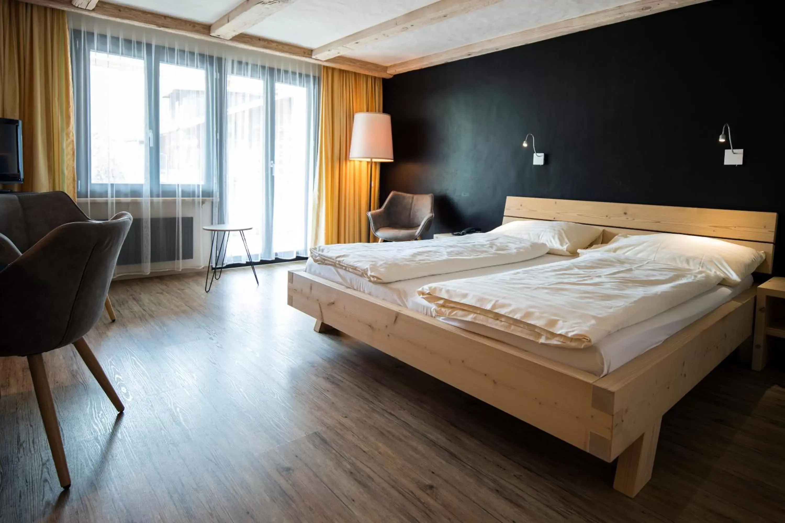 Bed in Hotel Alphorn