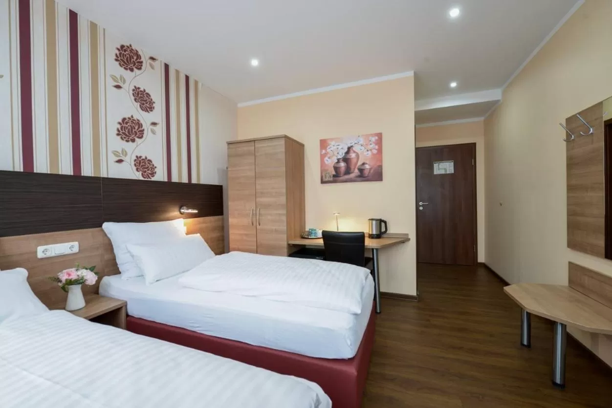 Bed in Hotel City Panorama