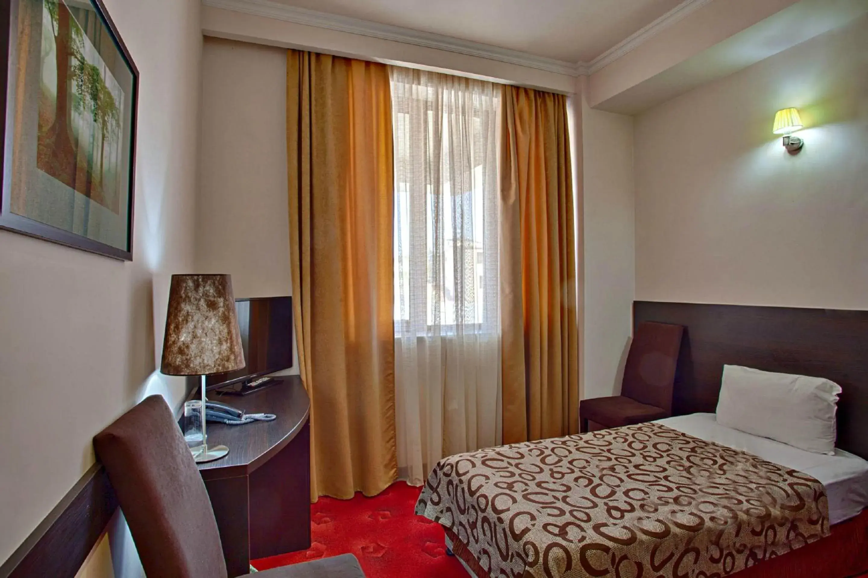 Photo of the whole room, Bed in Regineh Hotel