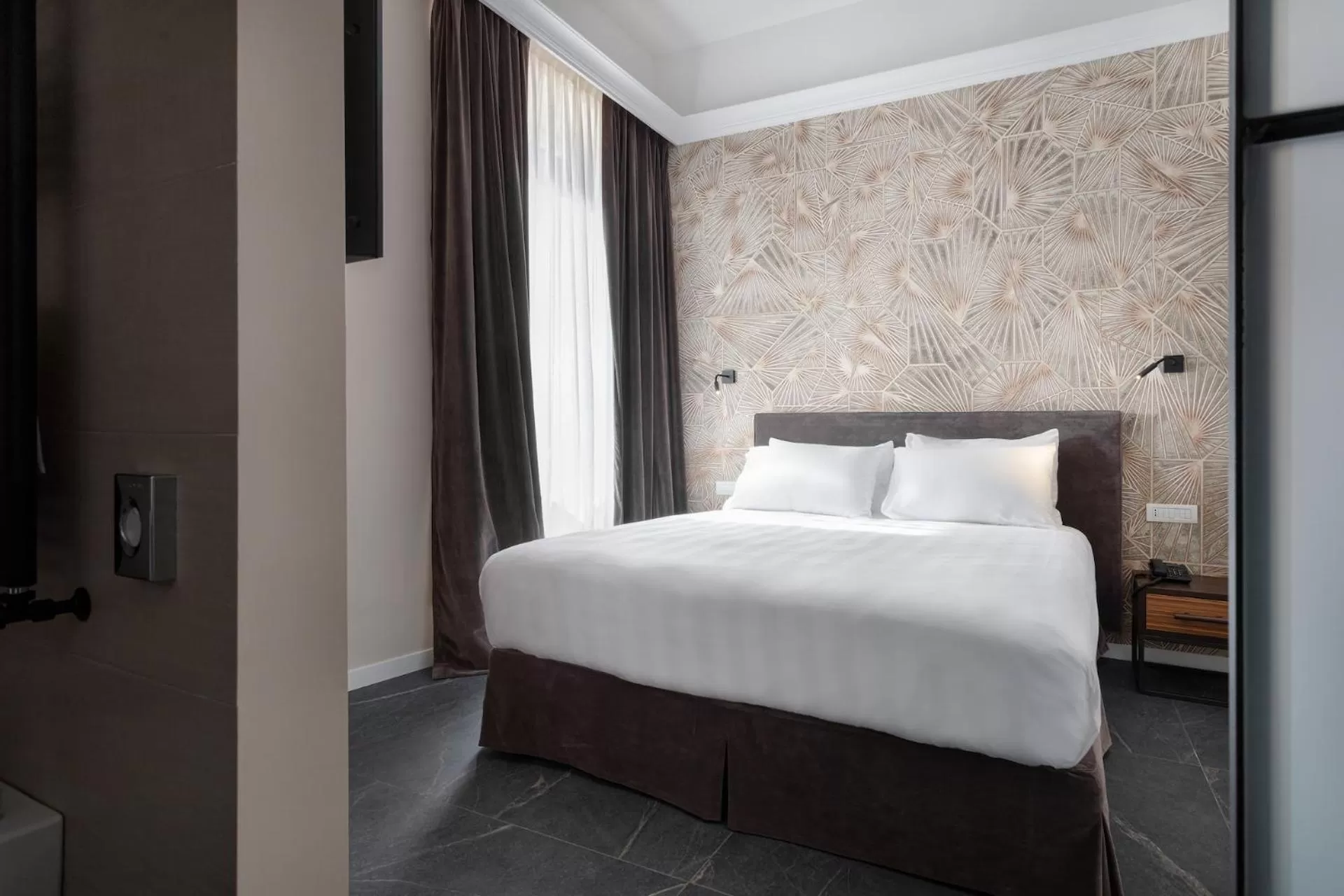 Bed in Hotel Poerio 25 Boutique Stay