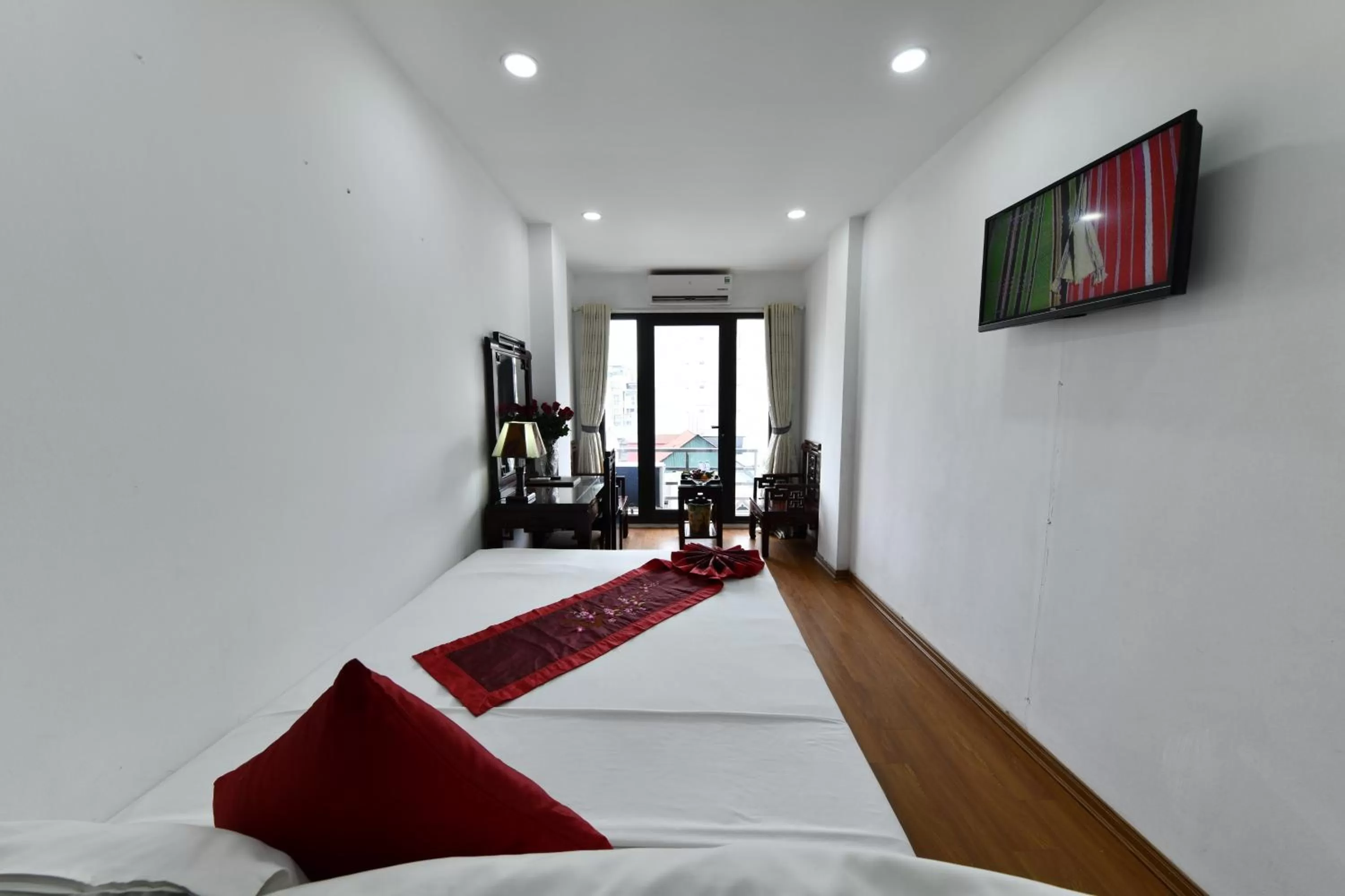 Bed in Phoenix Legend Hotel Hanoi