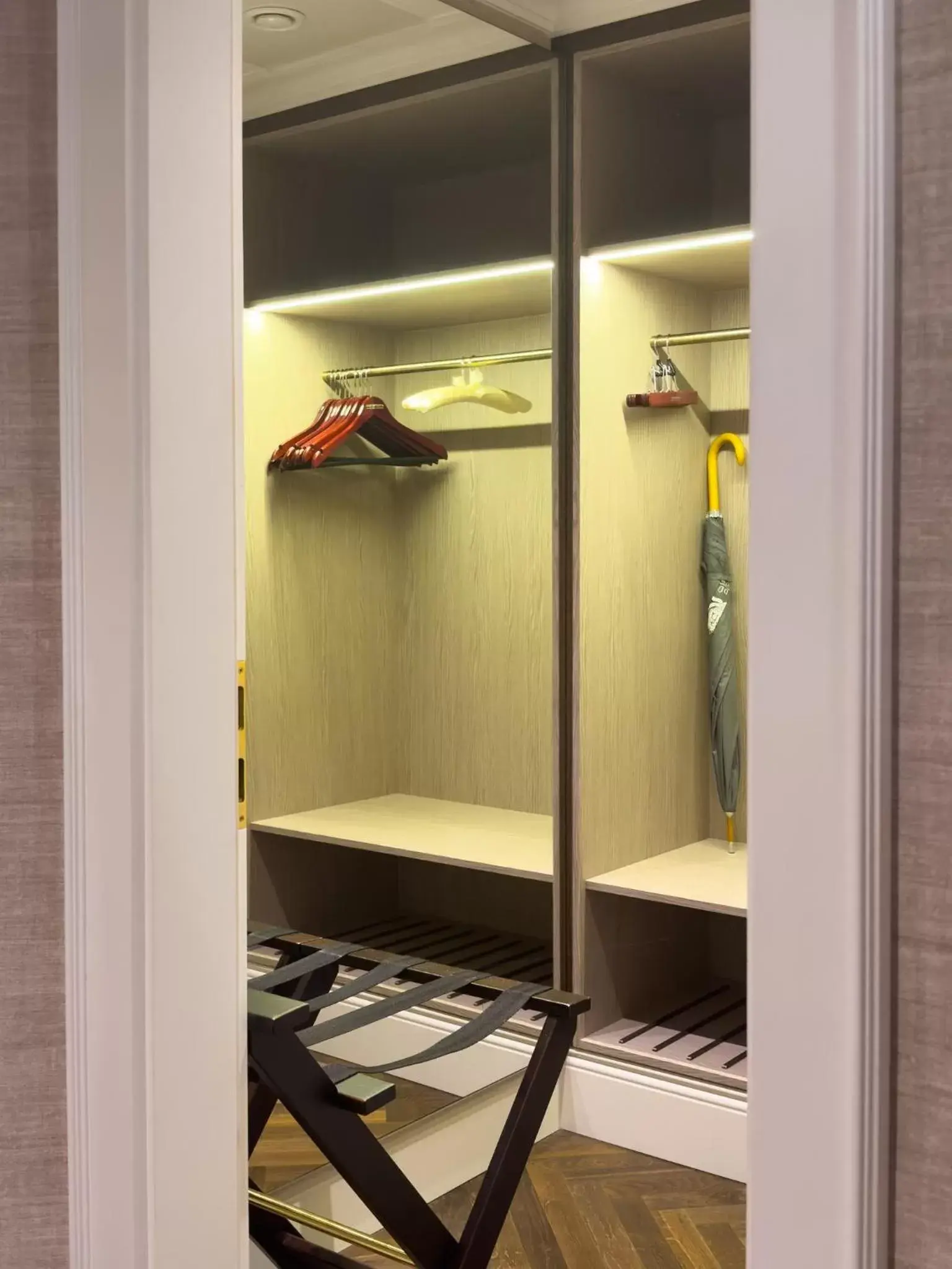 wardrobe, TV/Entertainment Center in Steigenberger Icon Parkhotel Düsseldorf