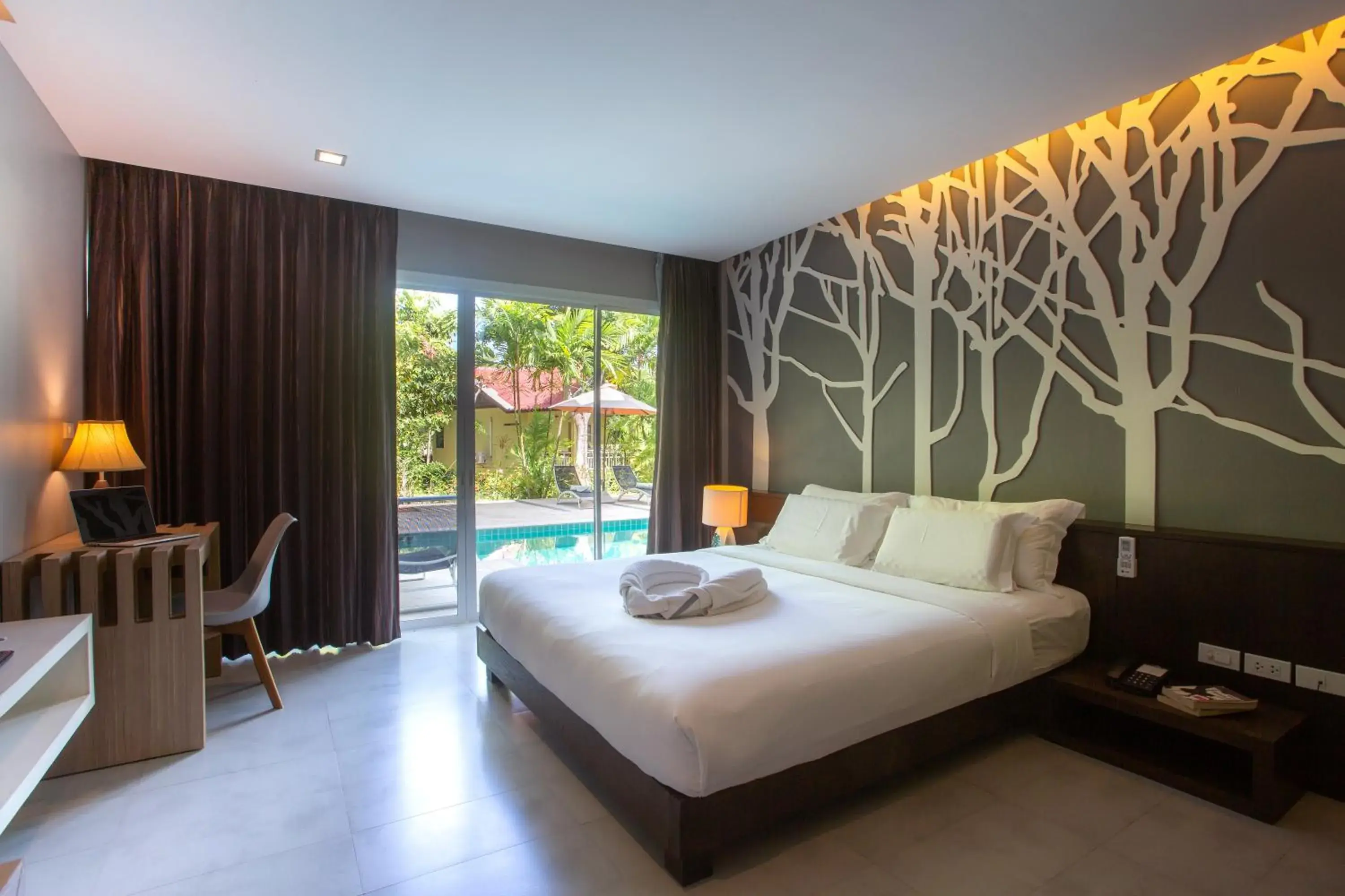 Bed in Panalee Koh Samui Resort - SHA Plus