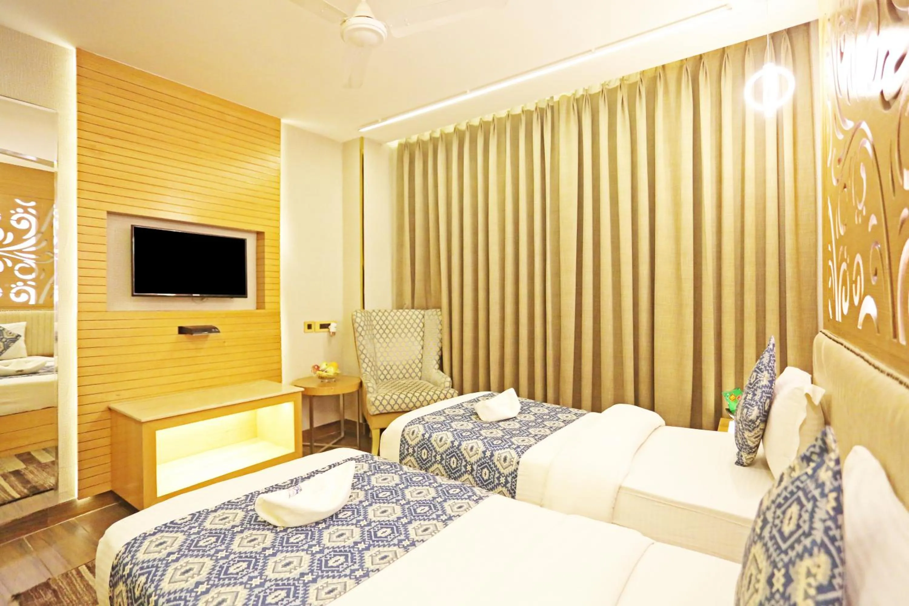 Bed in JRD Luxury-Business Hotel