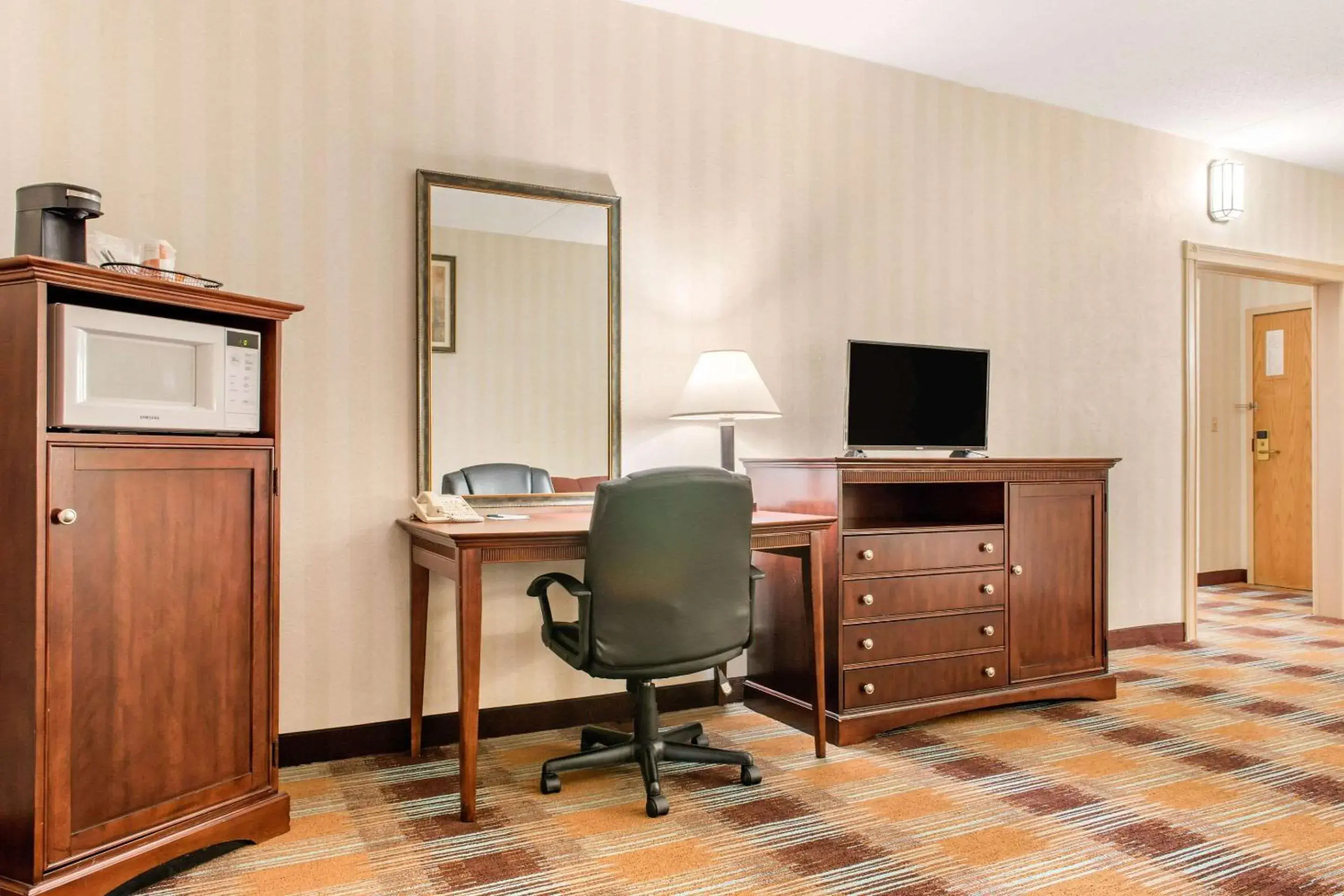 Photo of the whole room, TV/Entertainment Center in Quality Inn & Suites Miamisburg - Dayton South