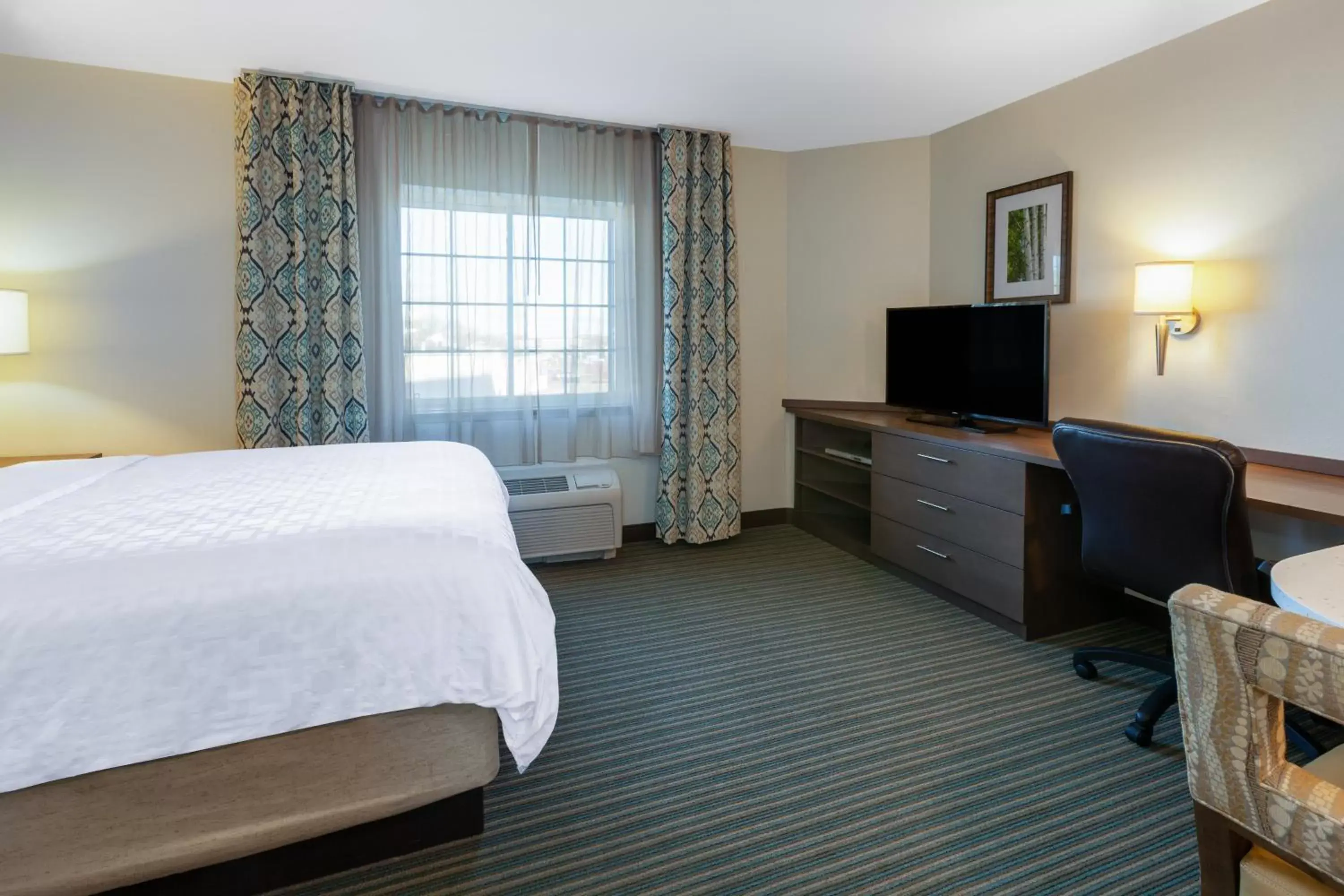 Photo of the whole room, Bed in Candlewood Suites-West Springfield, an IHG Hotel