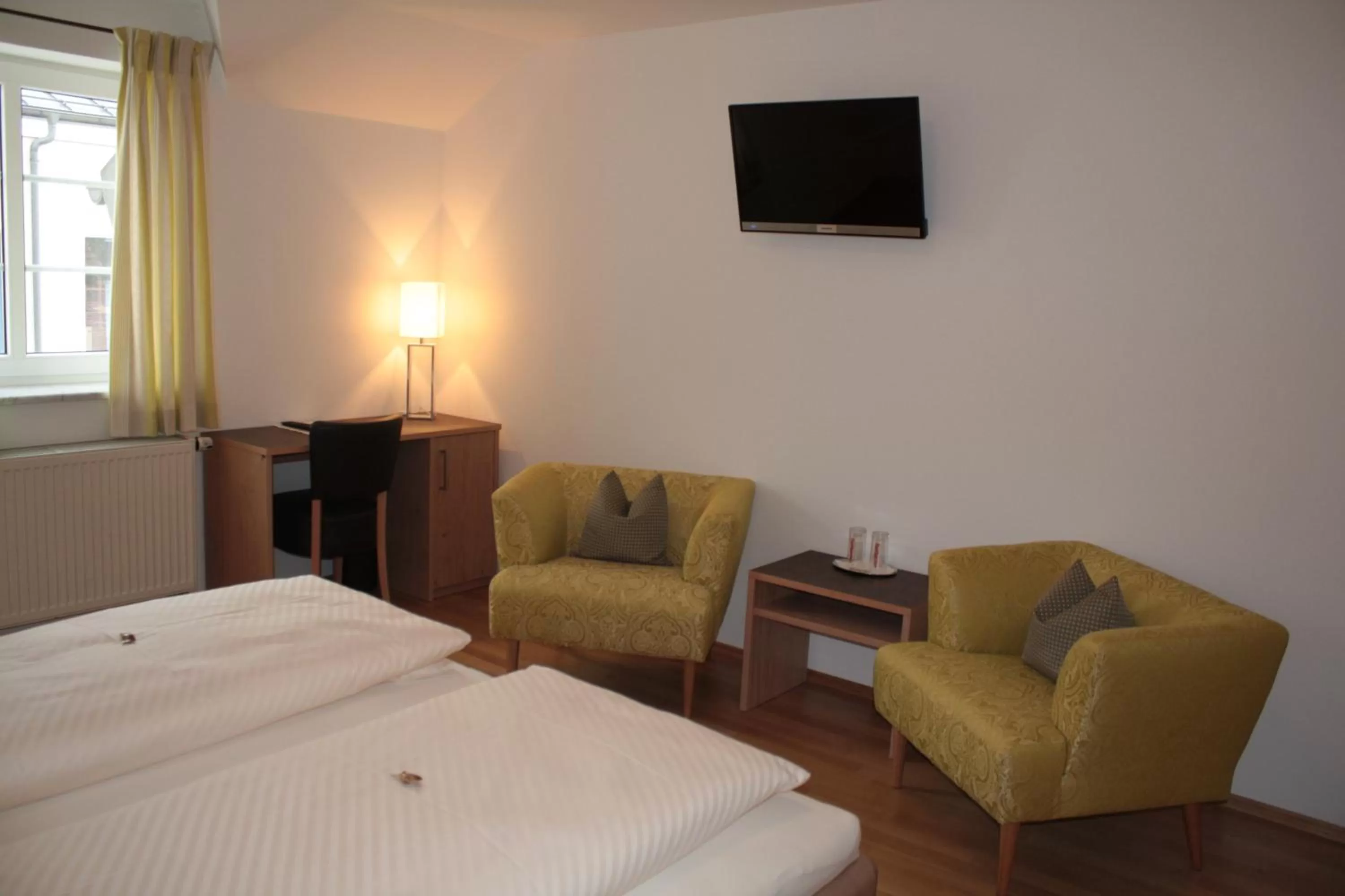 Photo of the whole room, Bed in Bäckerei Konditorei Frühstückspension WAGNER