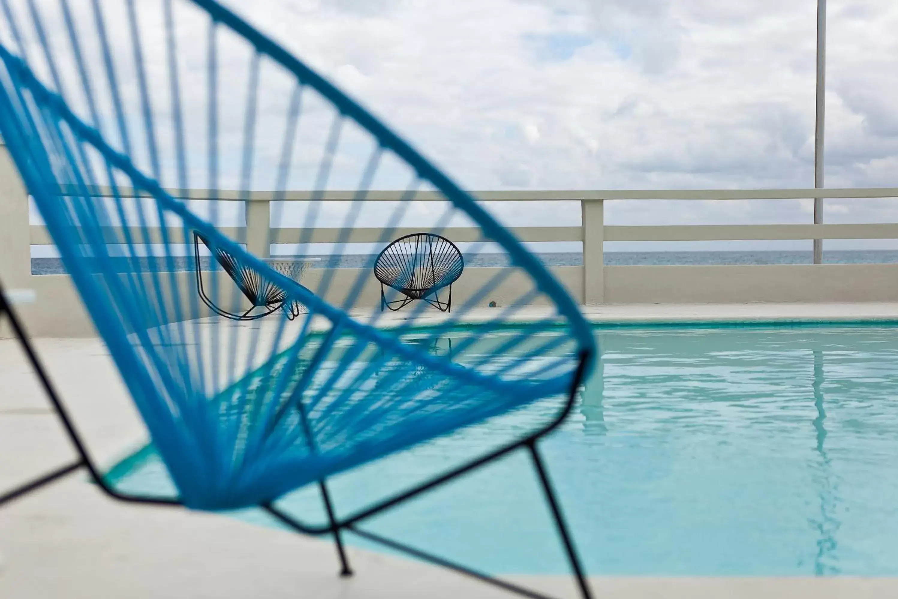 Swimming pool, Balcony/Terrace in Rocamar Hotel Isla Mujeres