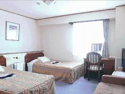 Photo of the whole room, Bed in Terminal Art Inn