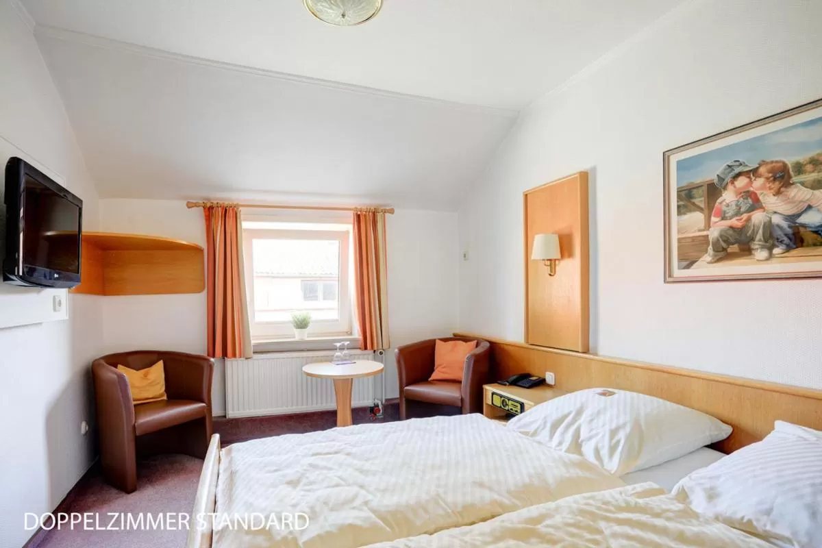 Bed in Stössels Hotel