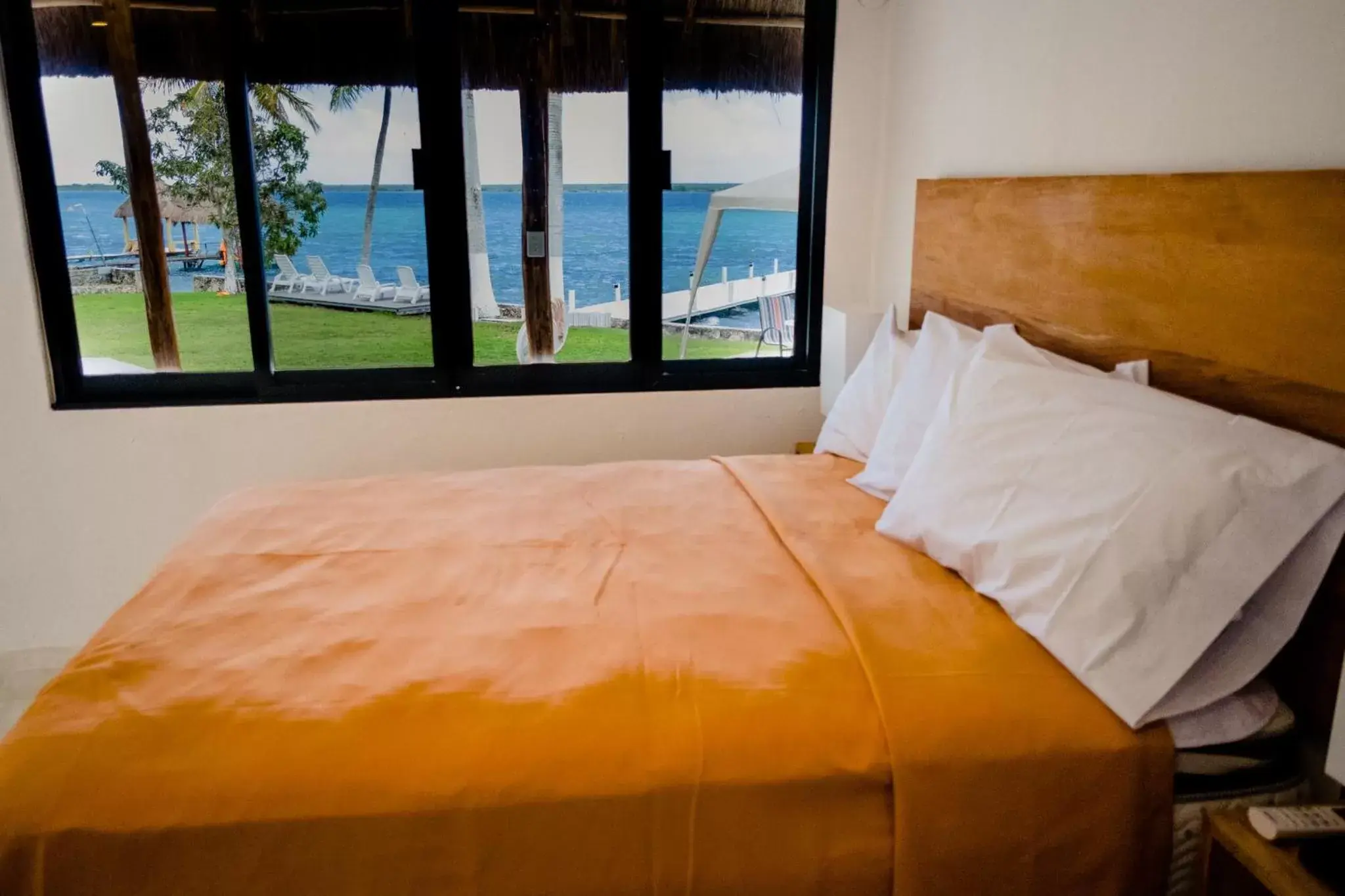 Bedroom, Bed in Royal Palm Bacalar Cabañas & Lagoon Club