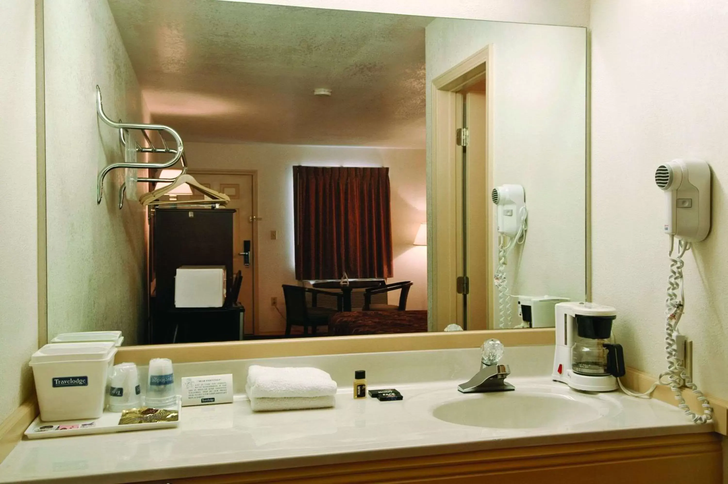 Photo of the whole room, Bathroom in El Rancho Motel