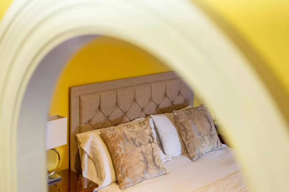 Bed in Angel and Royal Hotel