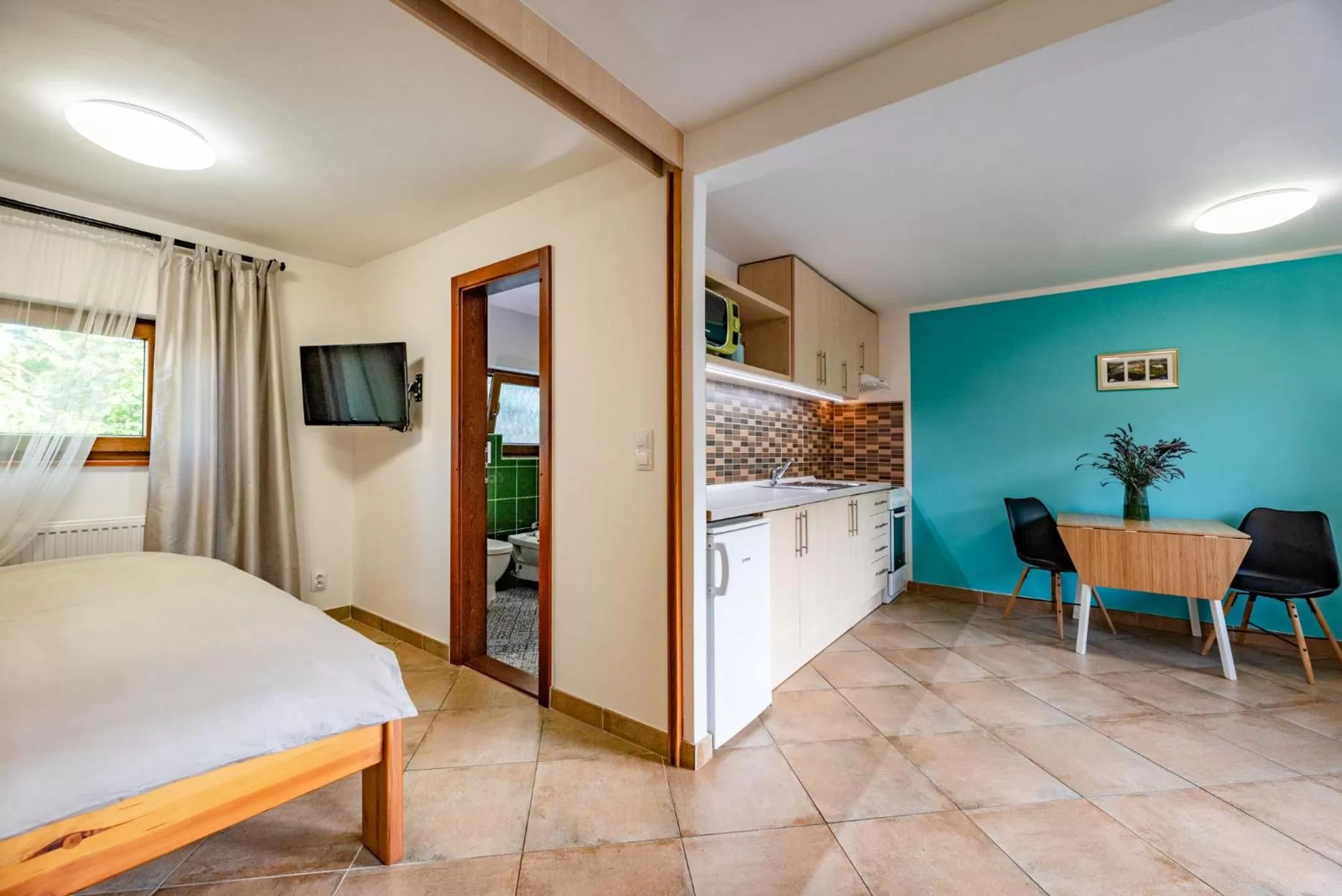 Kitchen or kitchenette, Bed in bergRESORT apartments