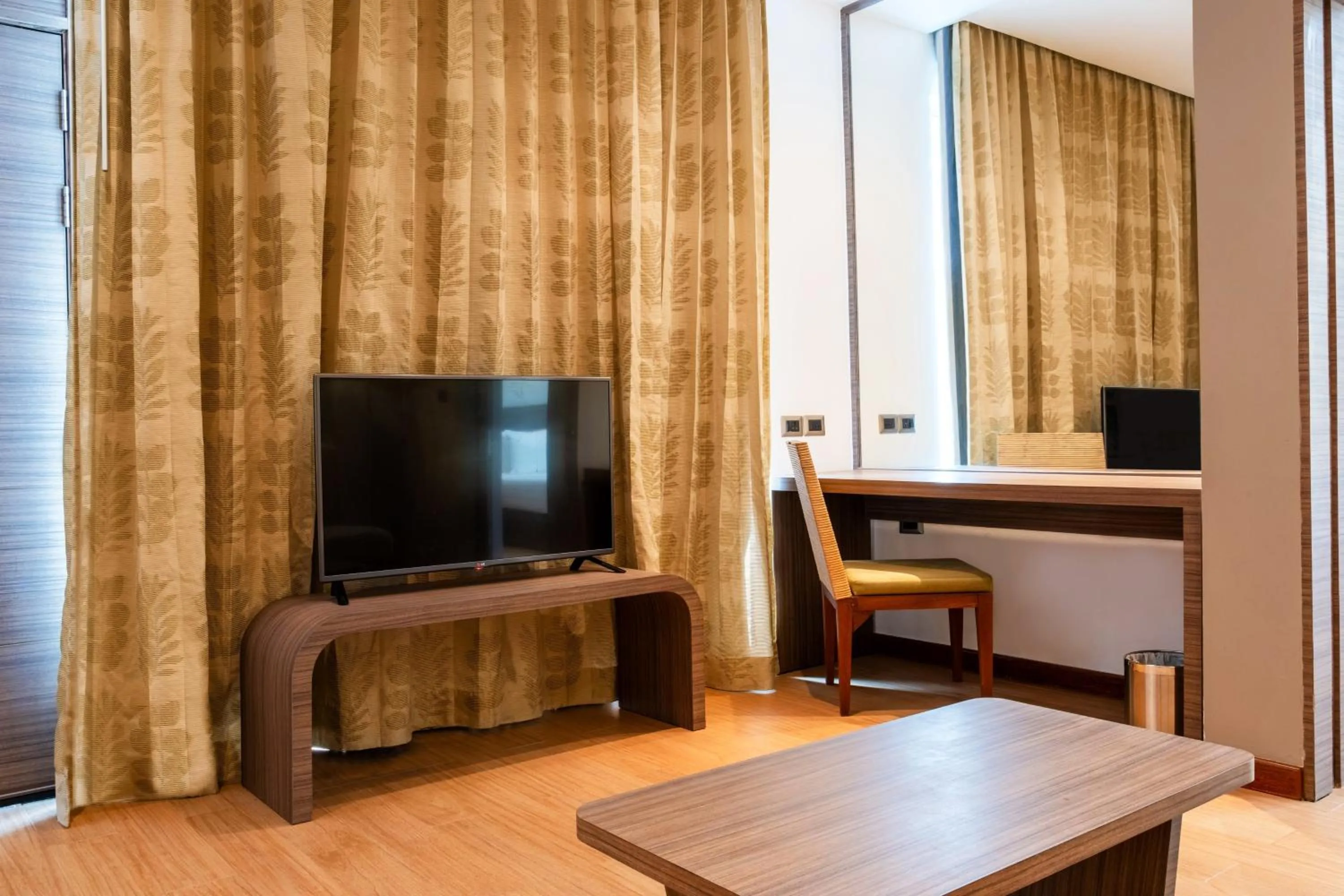 Photo of the whole room, TV/Entertainment Center in Destination Resorts Phuket Karon Beach - SHA Extra Plus