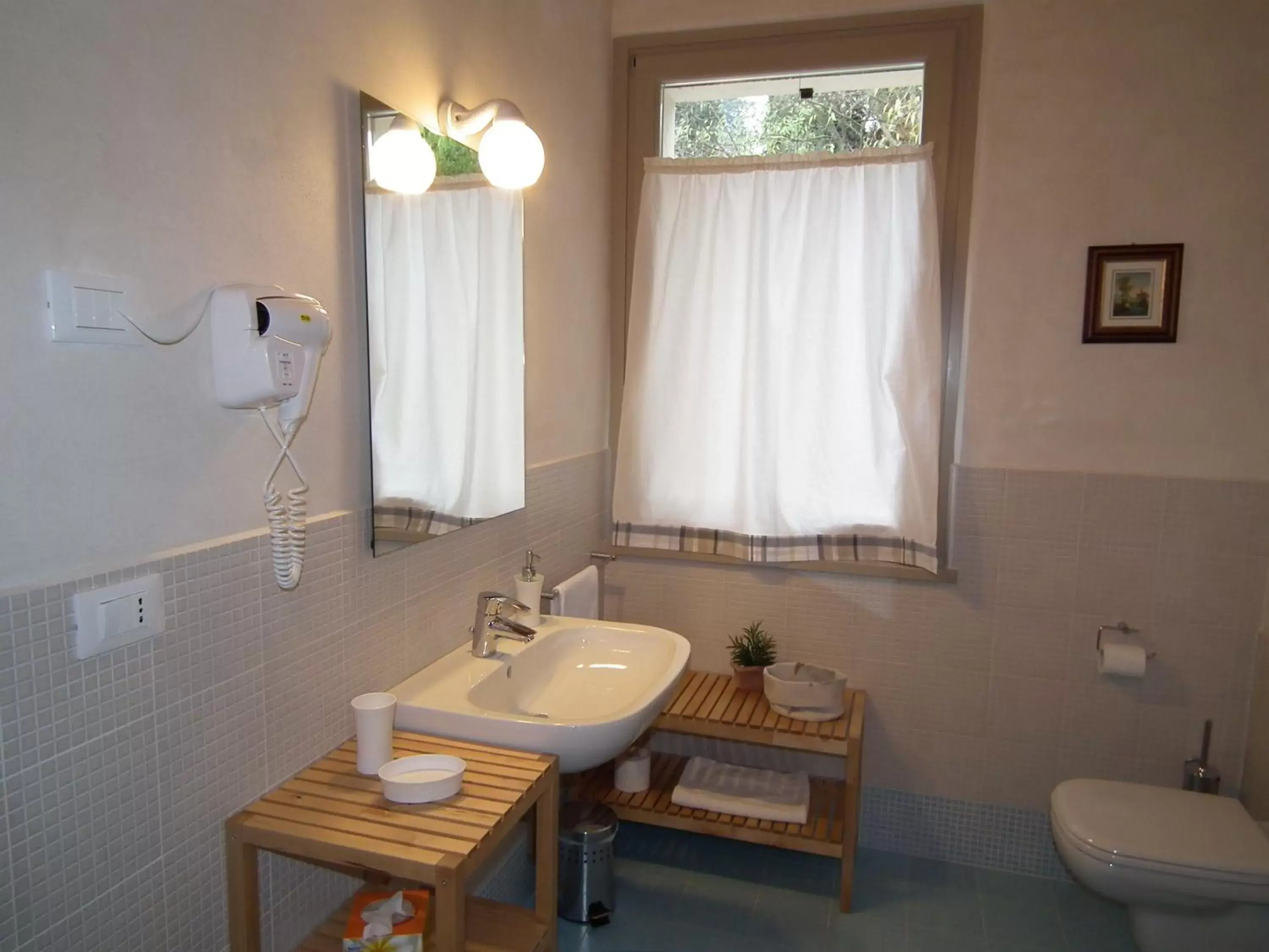 Bathroom in L'Isolo b&b e case vacanza