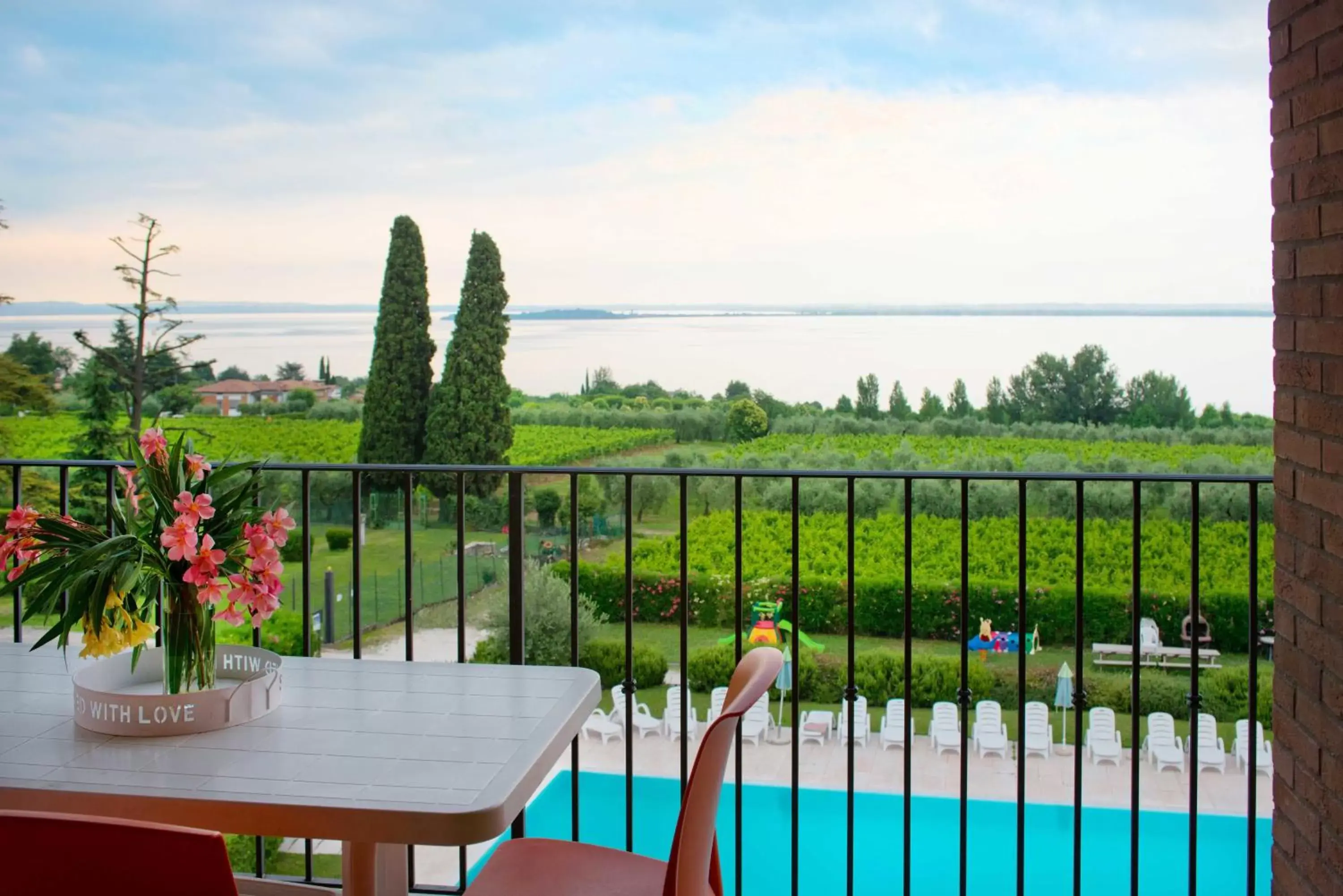 Balcony/Terrace, Pool View in Residence Corte Ferrari -Ciao Vacanze-