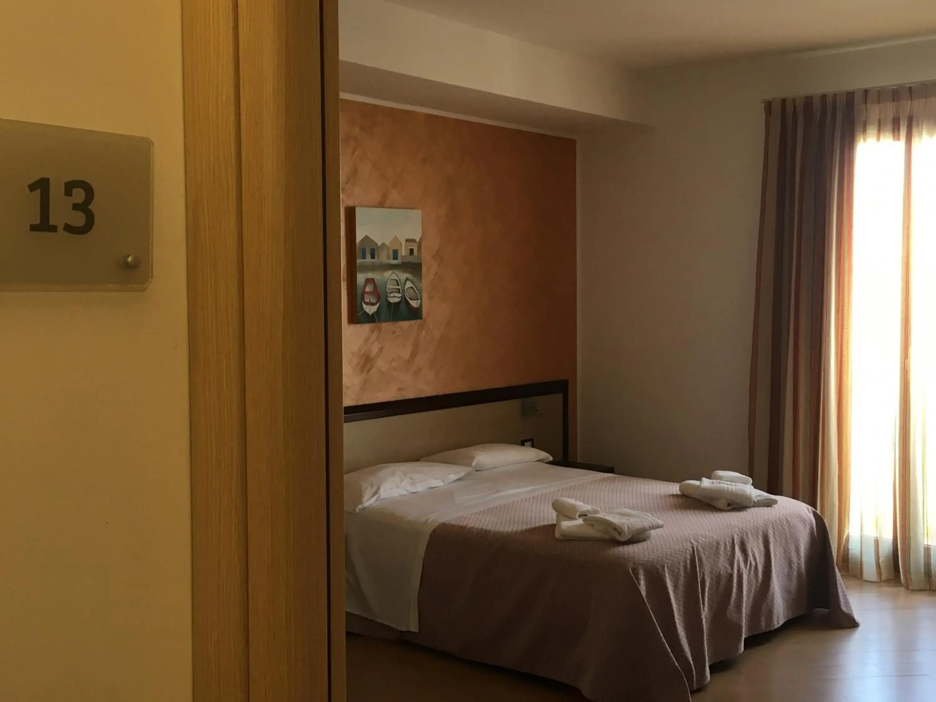 Bed in Albergo Perseo