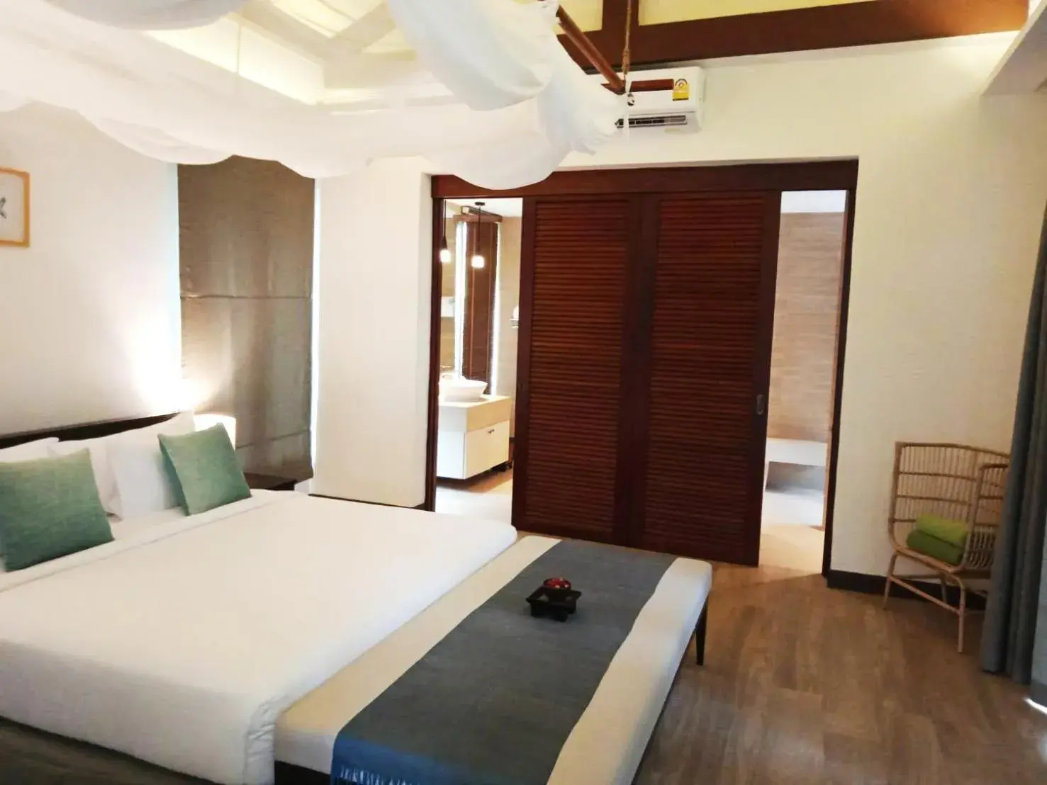 Bed in Triple Tree Beach Resort