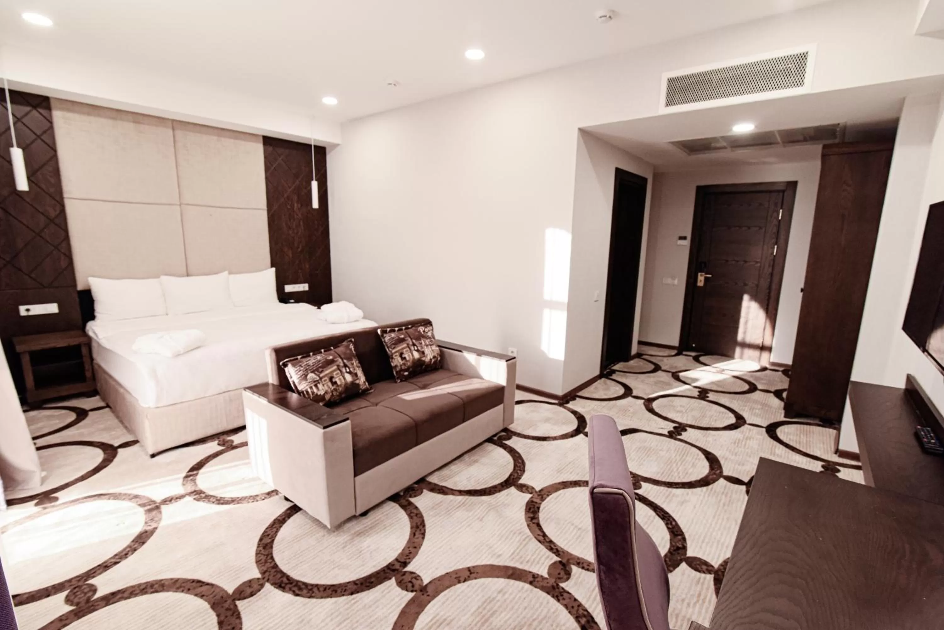 Bed in East Palace Hotel