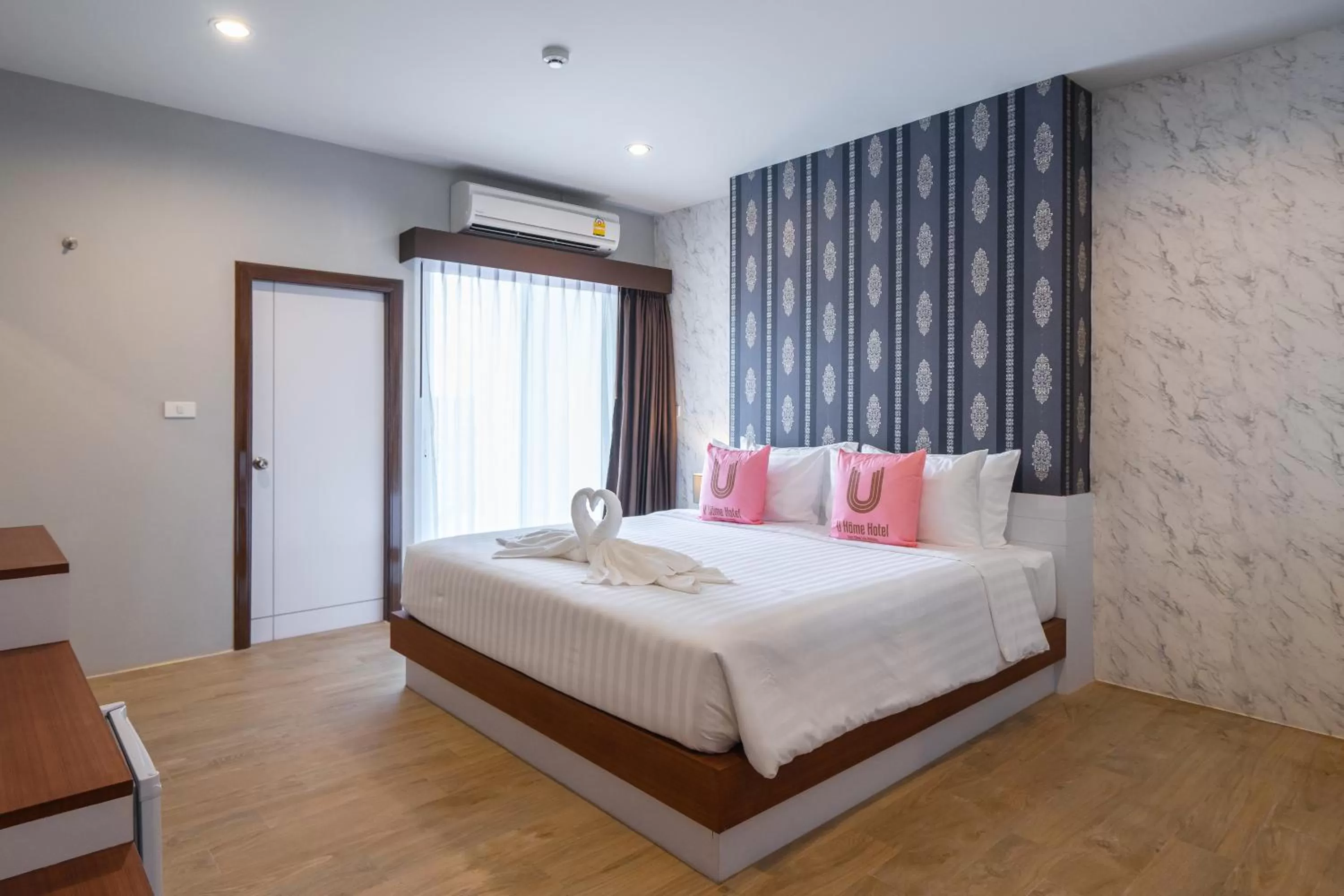 Bed in U- Homehotel Nakhonpanom