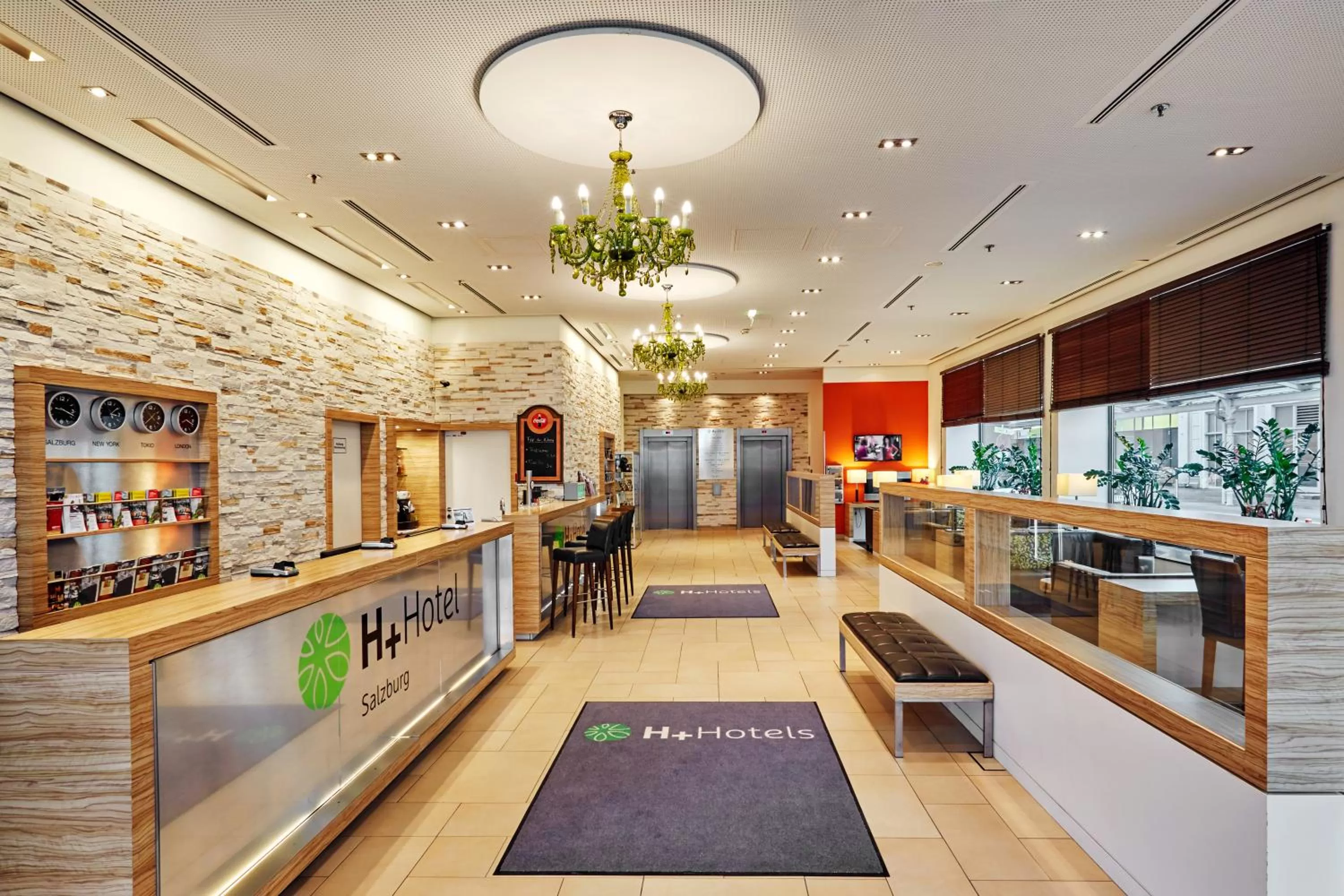Lobby or reception in H+ Hotel Salzburg