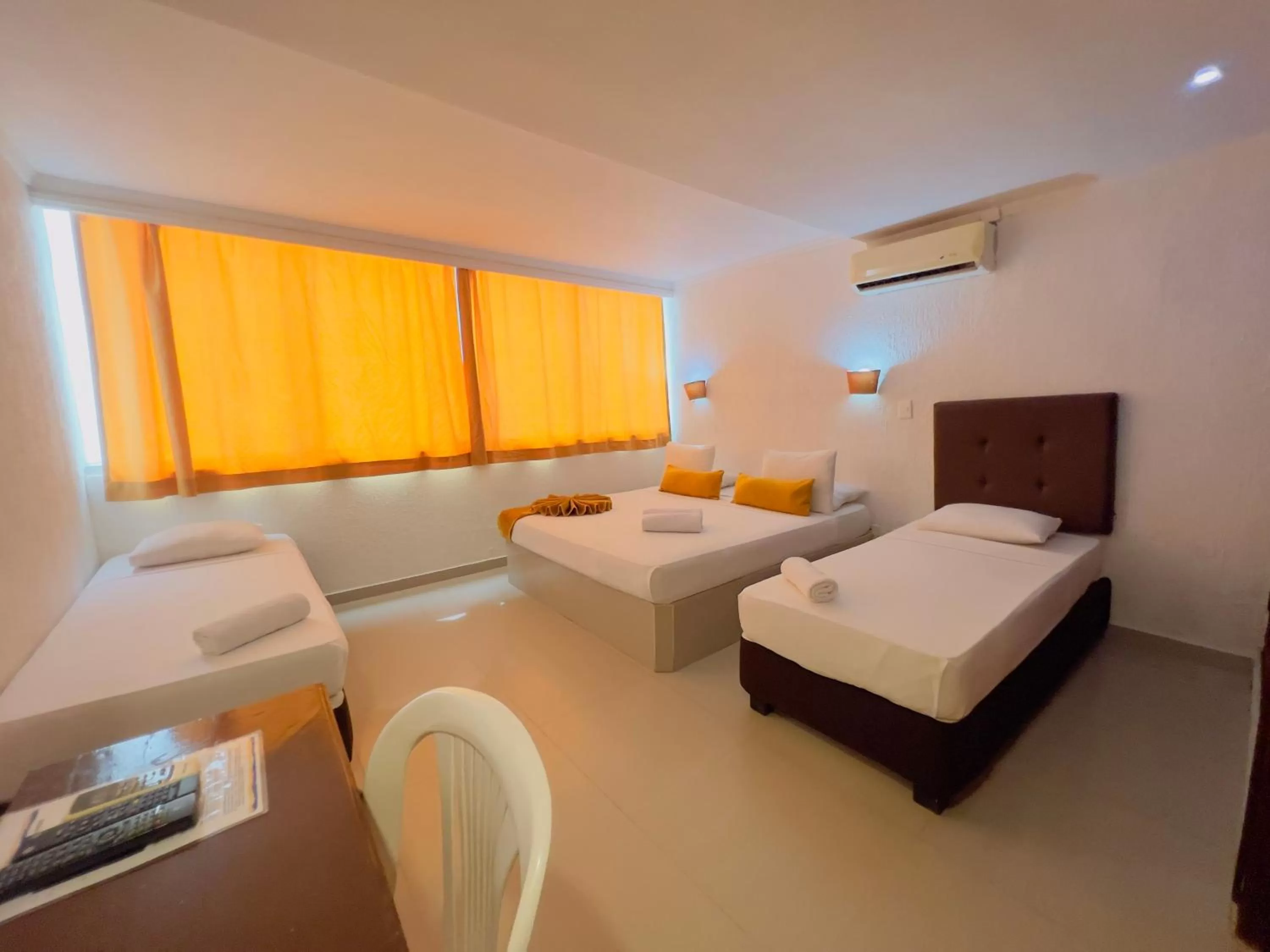 Seating area, Bed in Hotel Costa del Sol