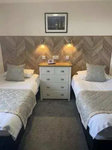 Bed in Claxton Hotel