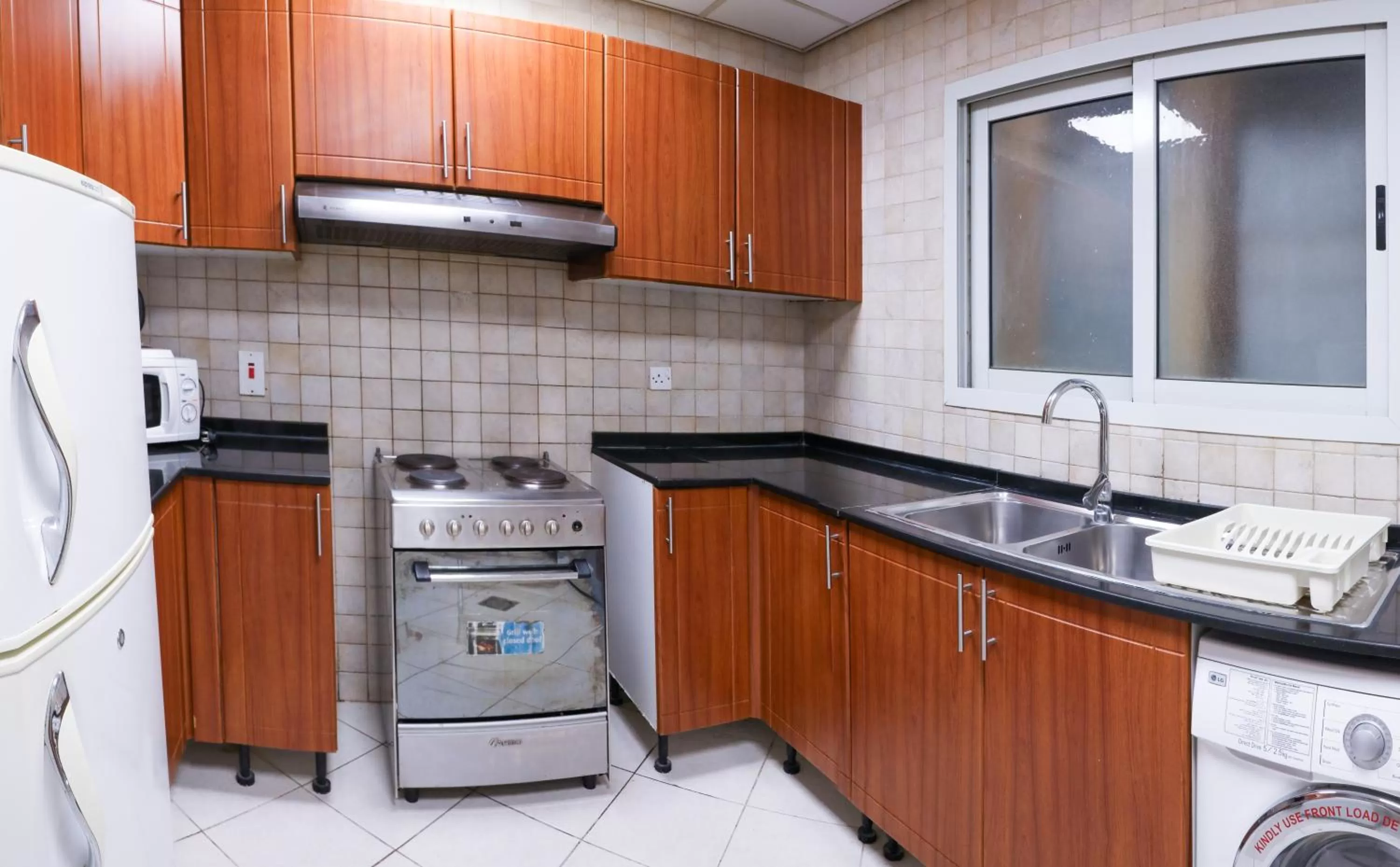 kitchen in Wescott Plaza Hotel Apartments LLC Formerly West Zone Plaza Hotel Apts