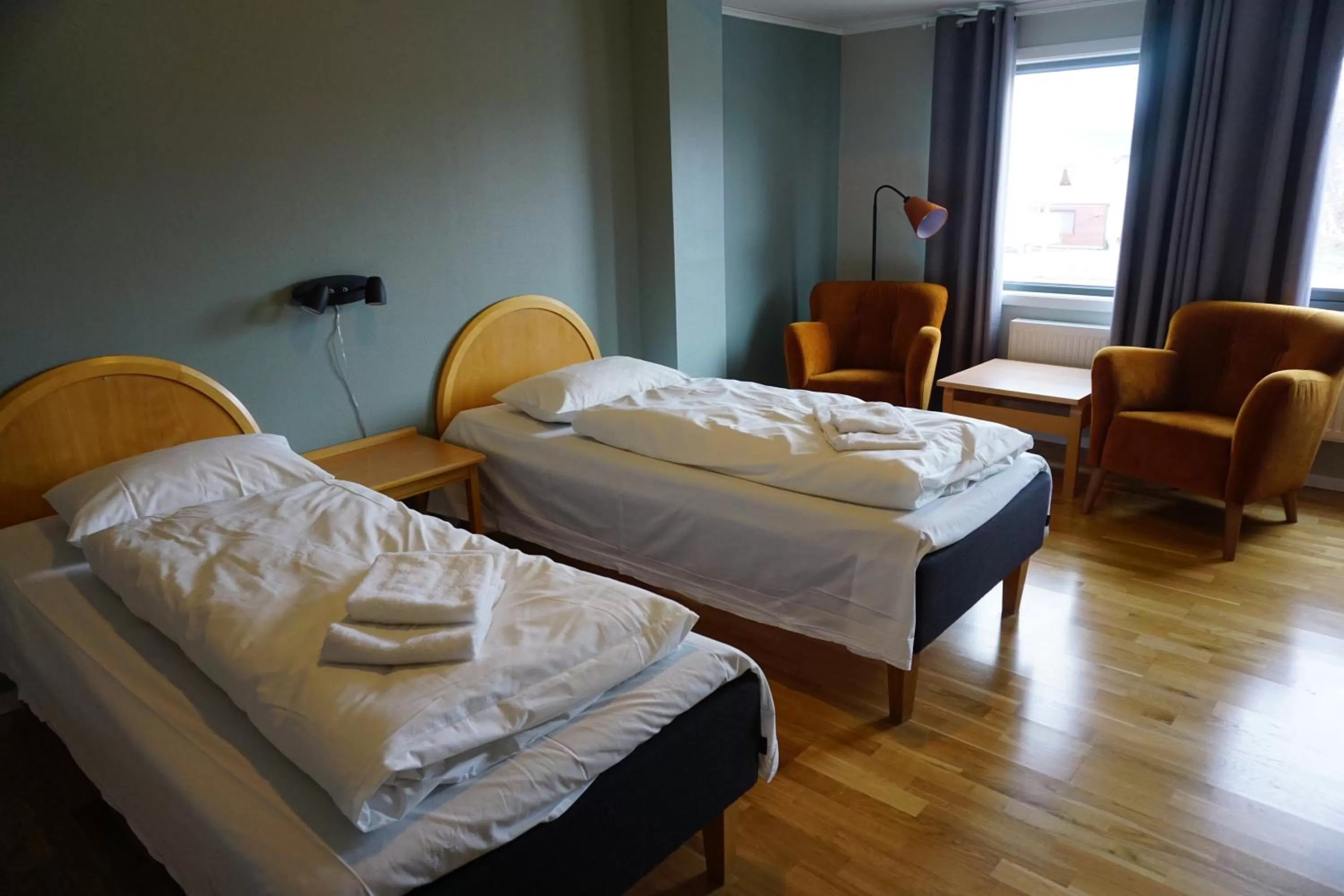 Photo of the whole room, Bed in Verdde Hotel Lakselv