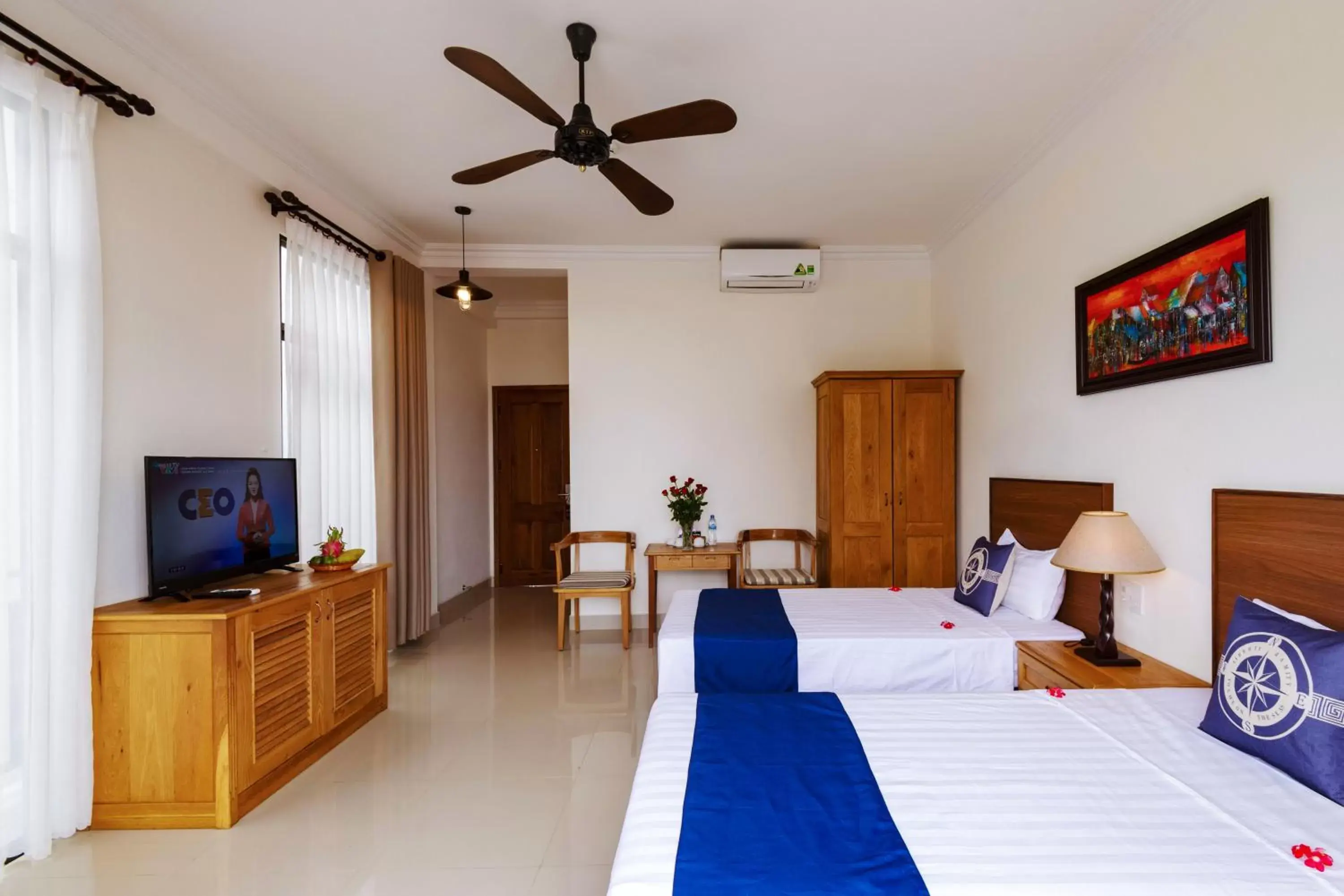 Bed, TV/Entertainment Center in Santa Sea Villa