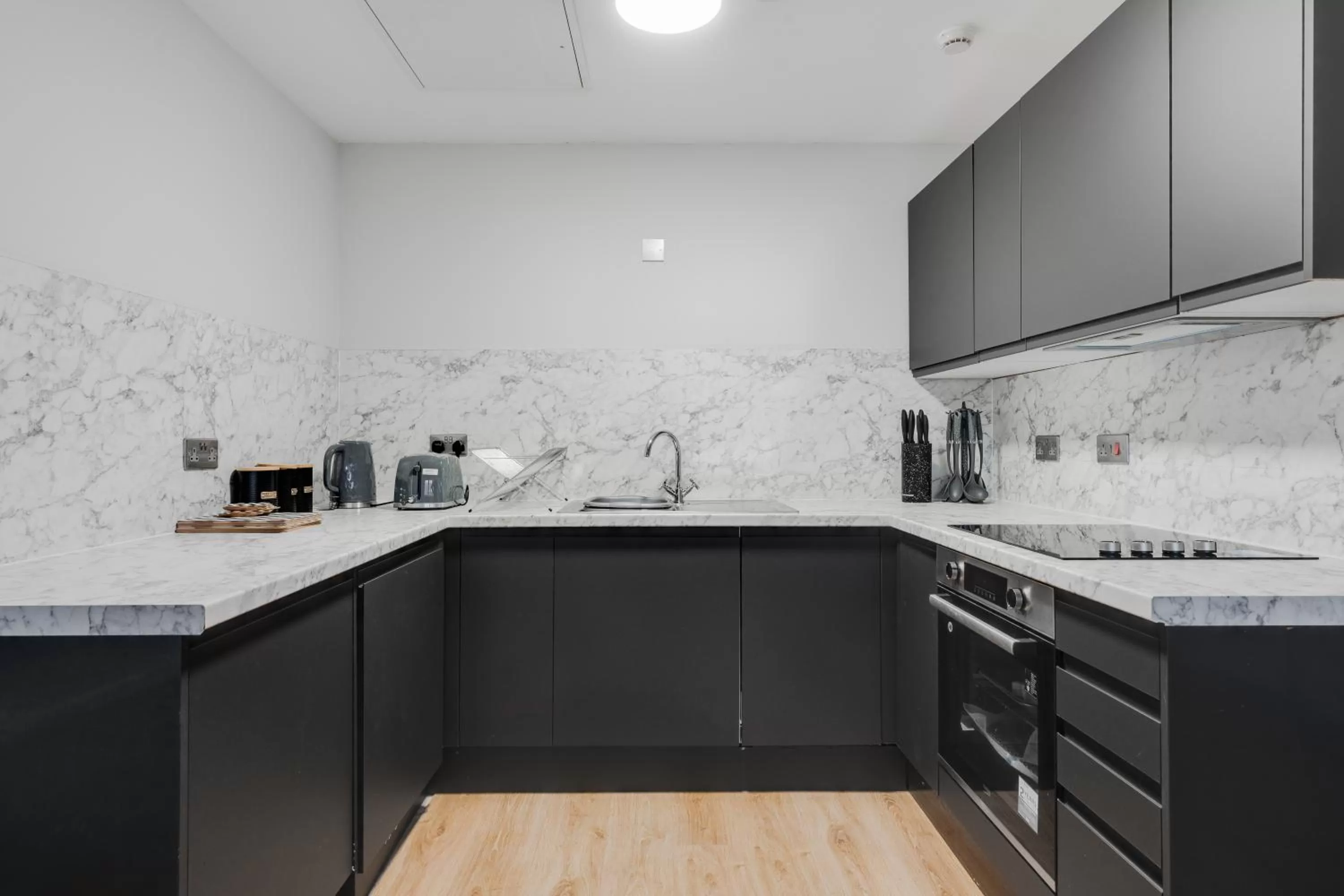 Kitchen or kitchenette in Stanley St Suites By GuestFirst
