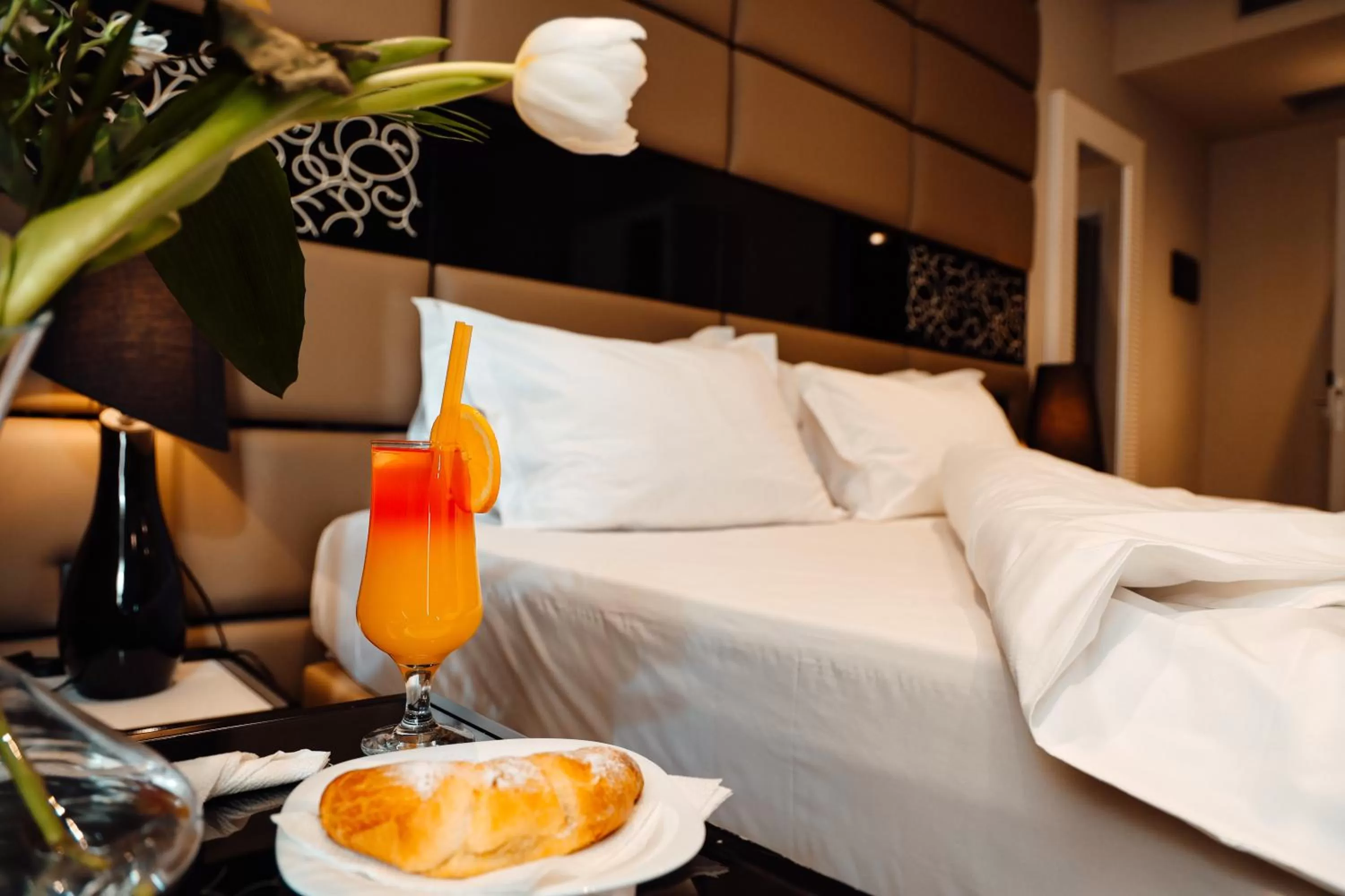 Bed in Senator Hotel