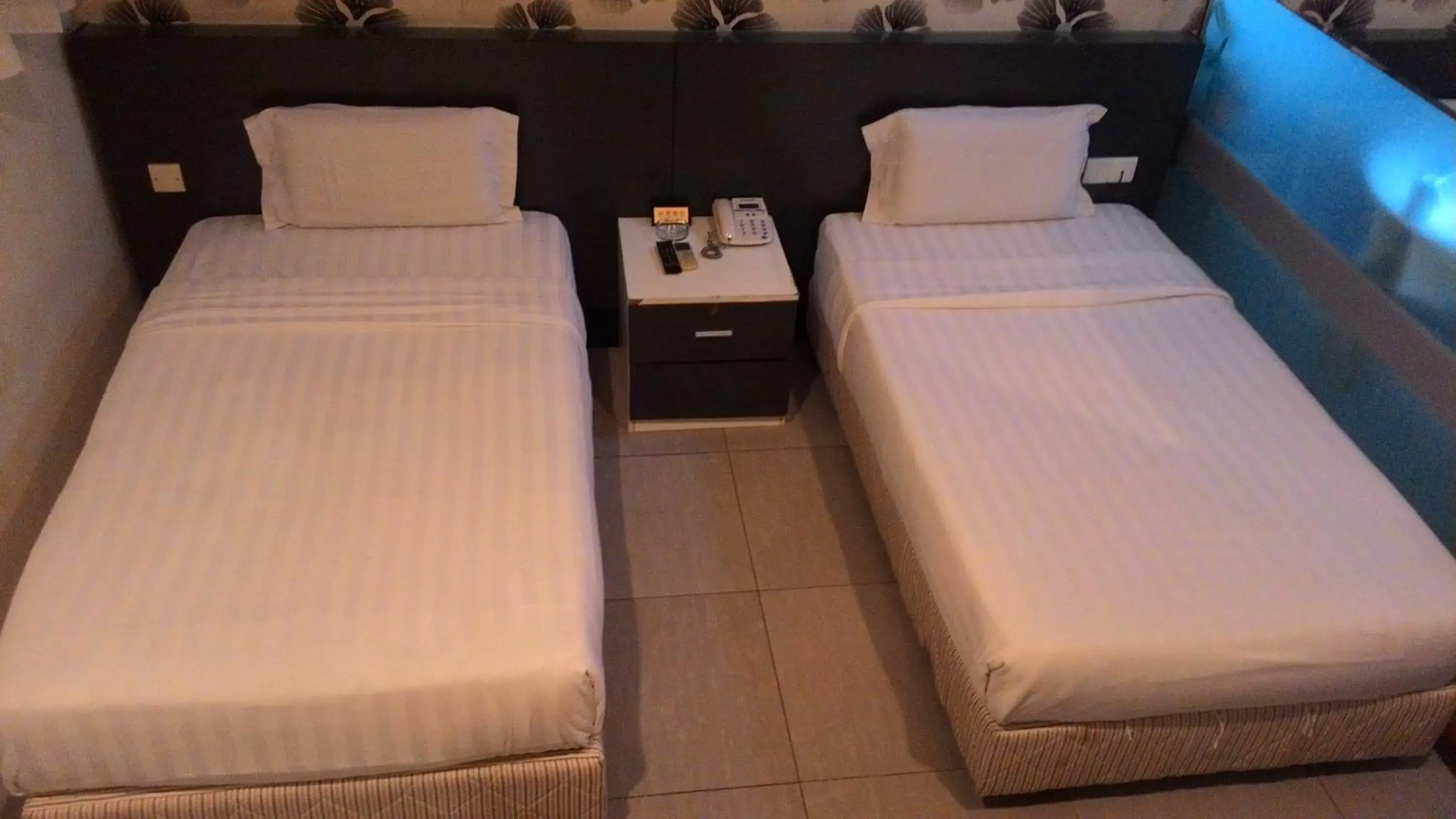 Bed in Prince Hotel