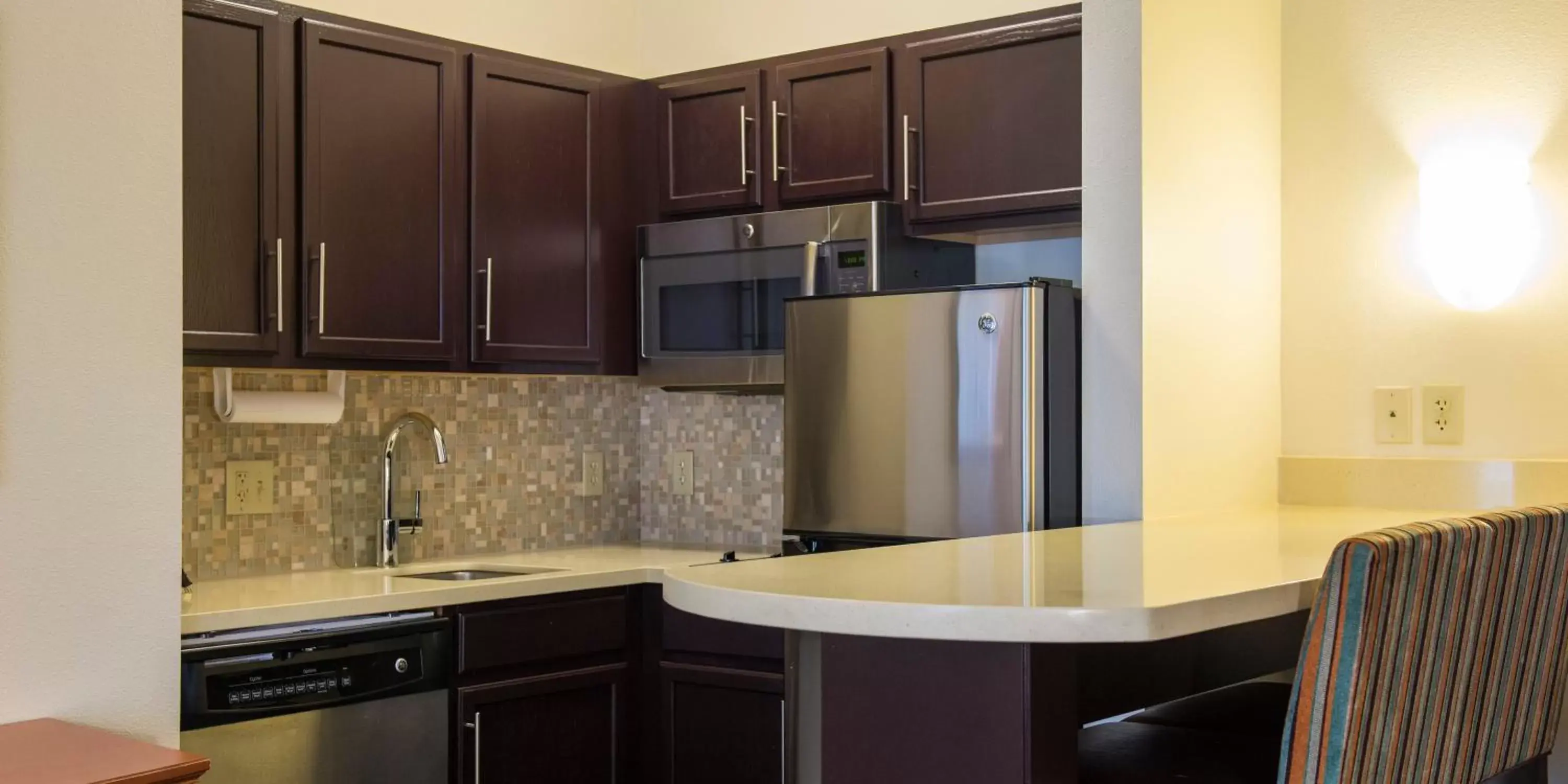 Photo of the whole room, Kitchen/Kitchenette in Staybridge Suites Fargo, an IHG Hotel