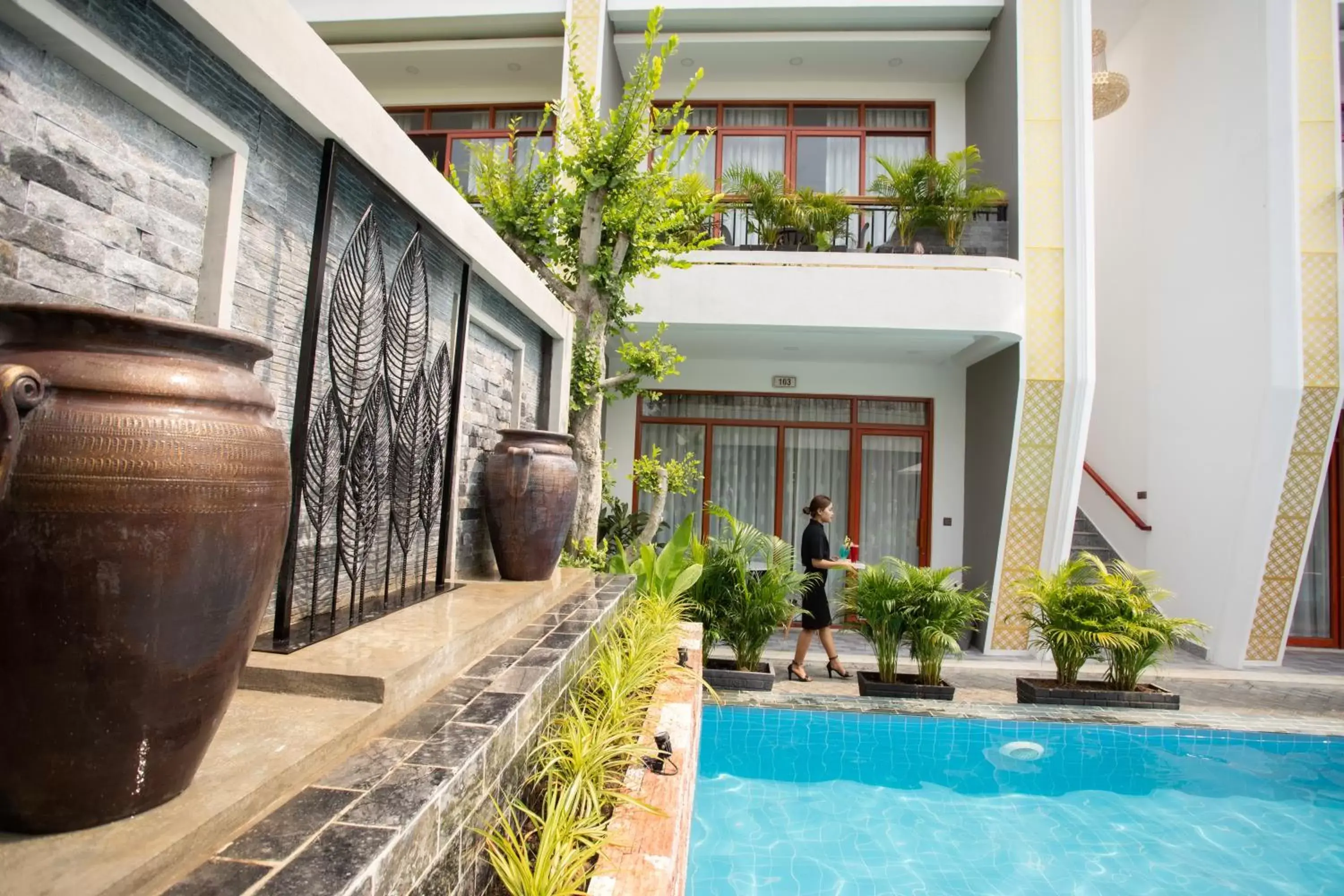 Swimming pool in Cambana La Riviere Boutique Swimming pool in Cambana La Riviere Boutique