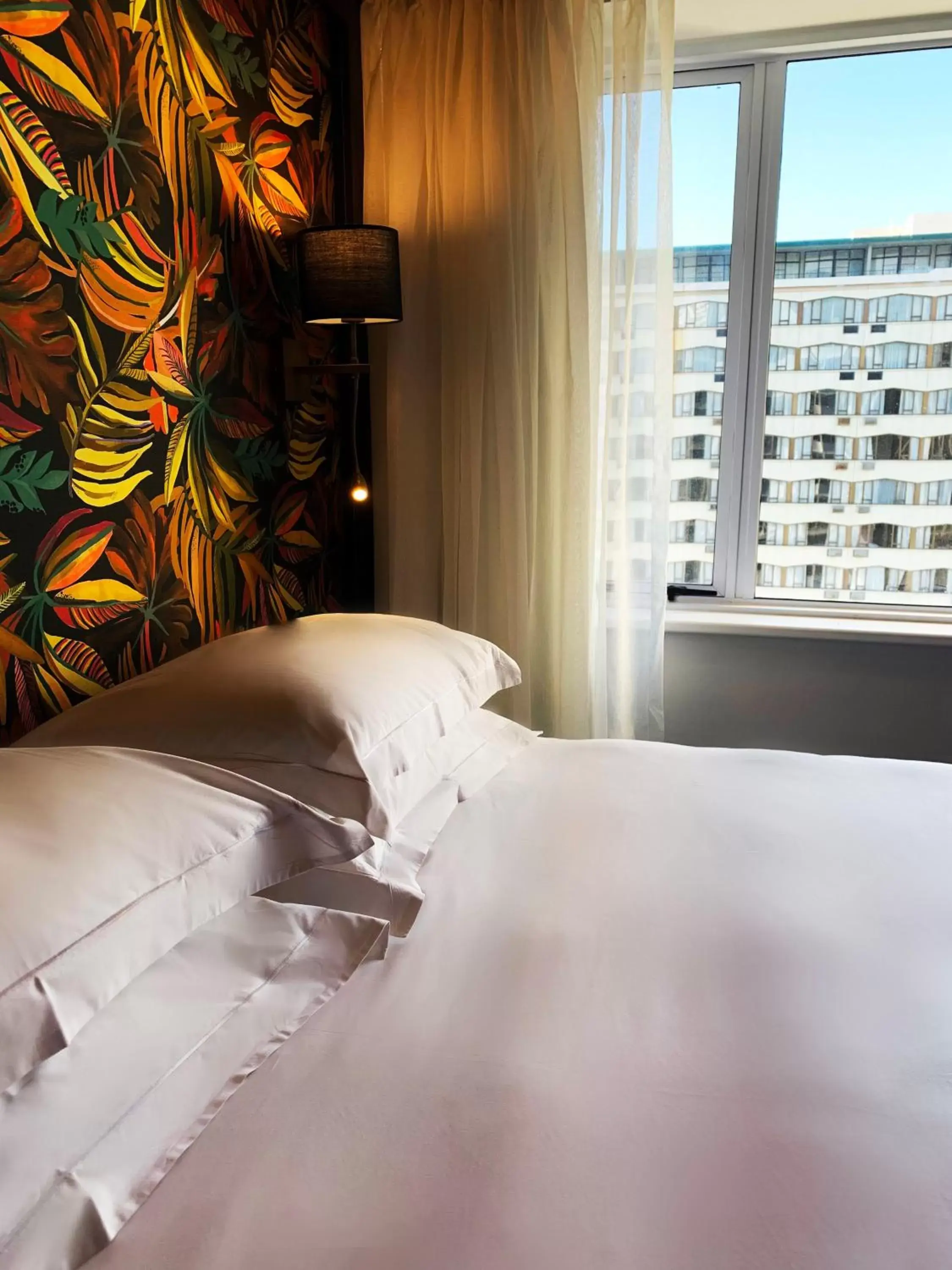 Bed in Signature Lux Hotel by ONOMO, Foreshore