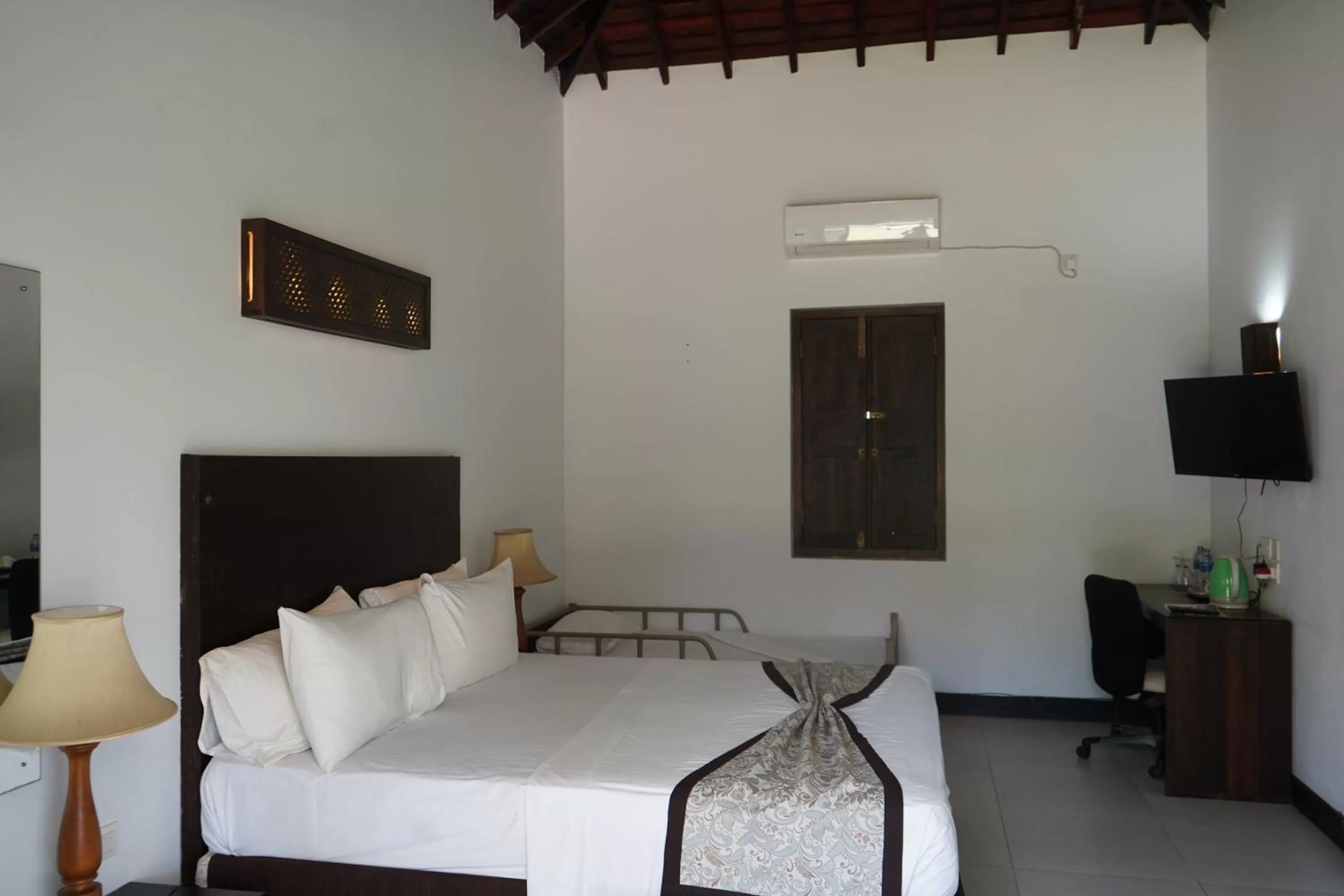 Bed in Amaluna Resorts