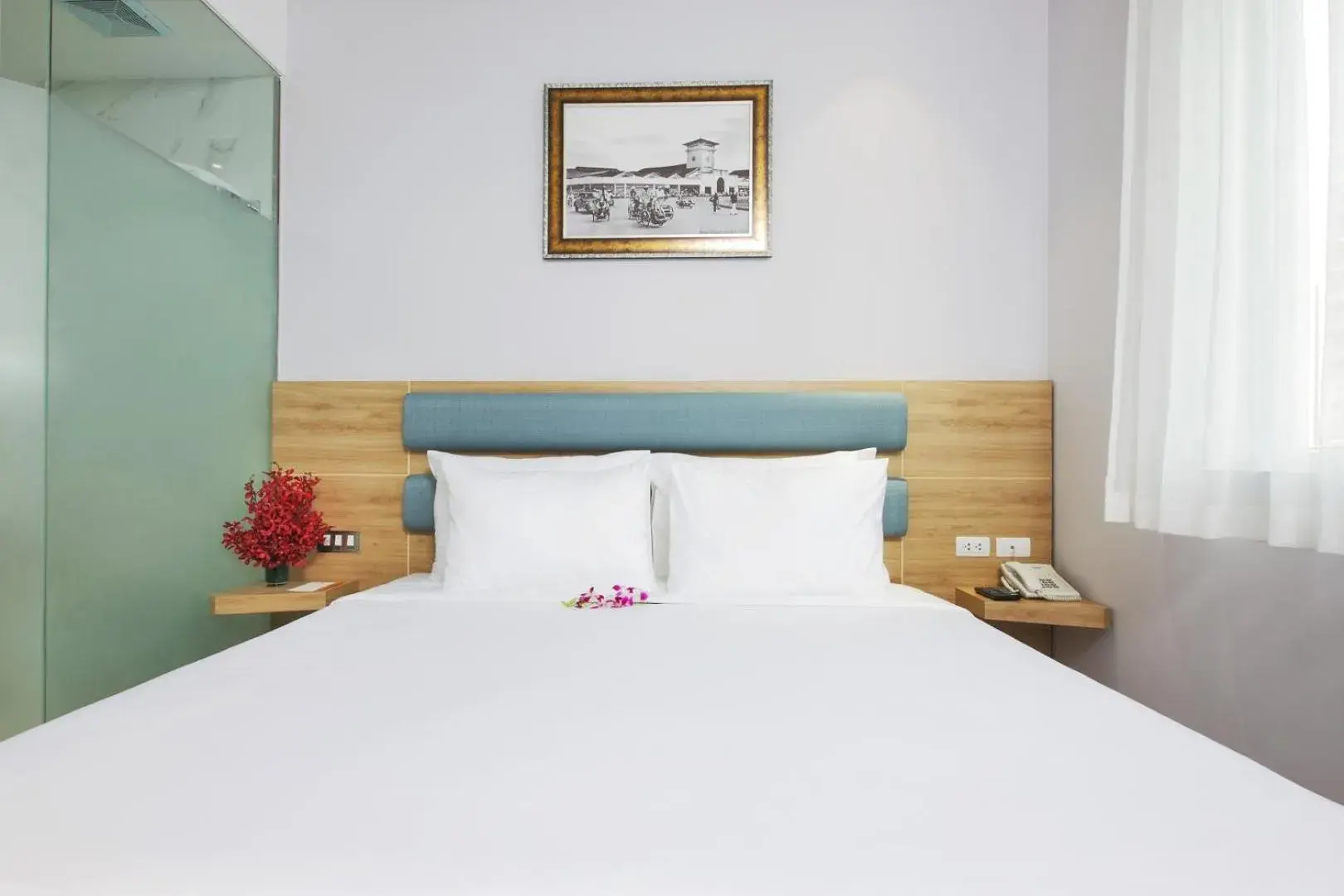 Bed in RAMADA ENCORE BY WYNDHAM SAIGON D1 - Formerly M Boutique Hotel Saigon